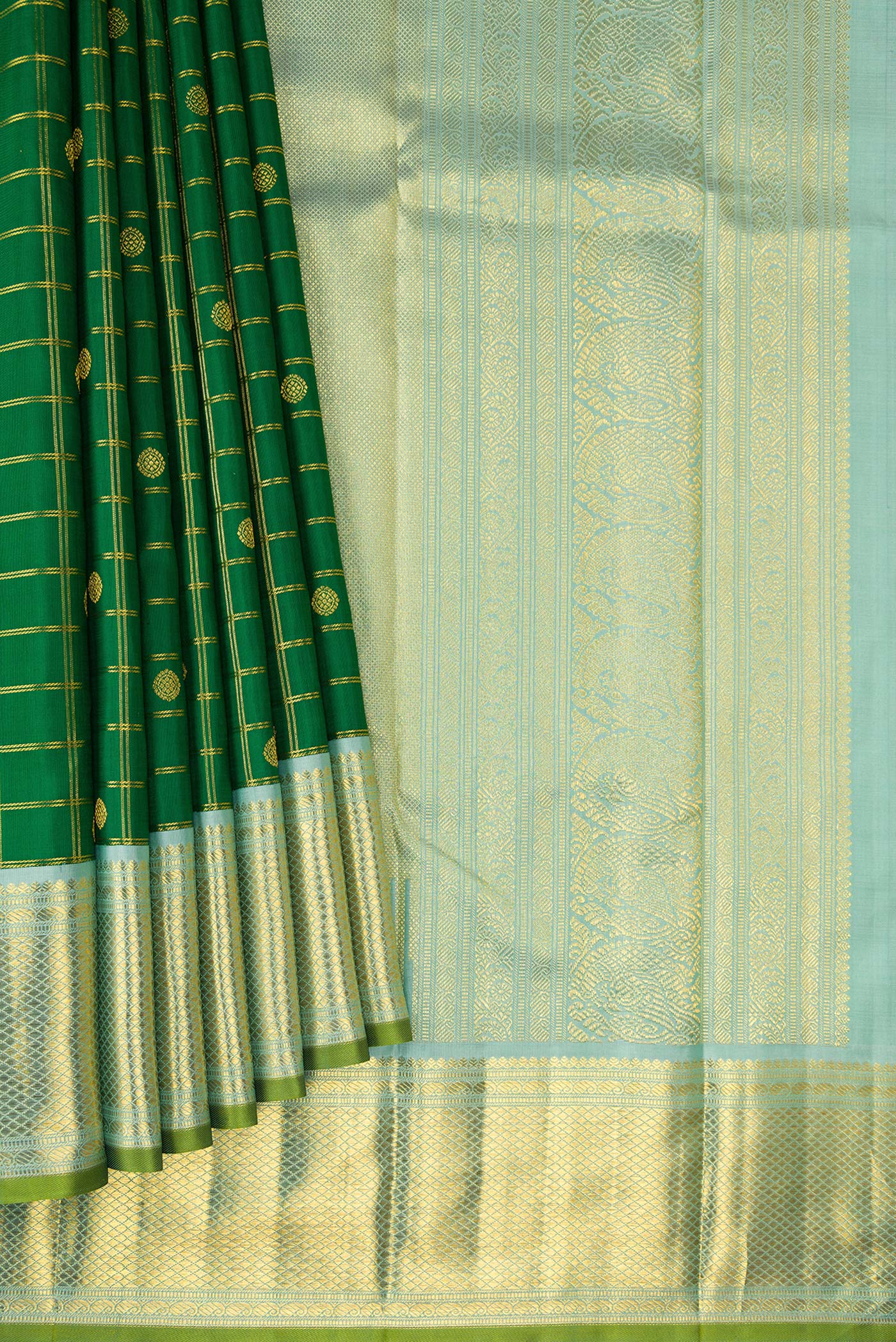 Pleats and pallu of Pure Silk Pure Zari Green Kanjivaram Saree with Checked design on the body and Zari Border. 