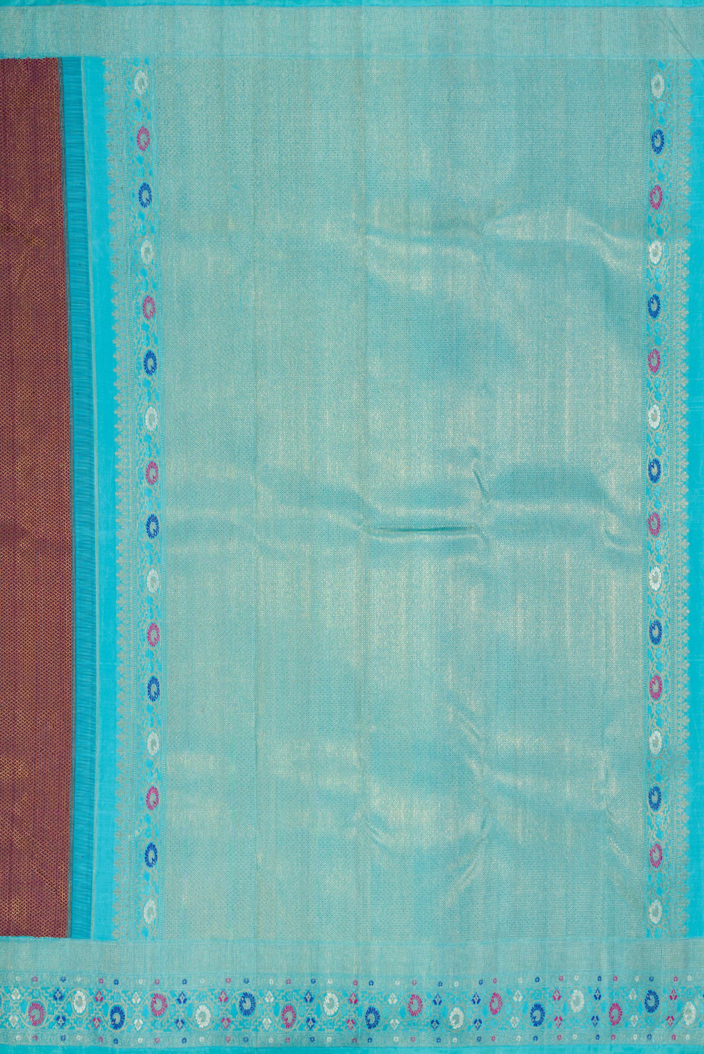 Close up image of the pallu of Burgundy Dual Tone Kanjivaram Silk Saree with Zari Brocade on the body and Fancy Border. 