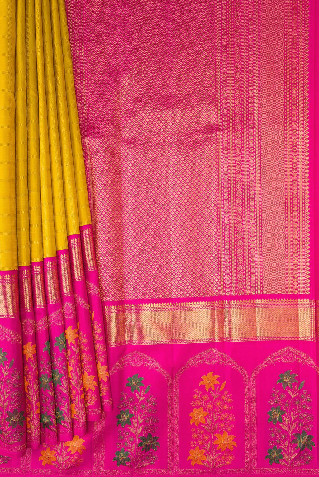 Pleats and pallu of Yellow Kanjivaram Silk Saree with Checked design on the body and Fancy Border. 