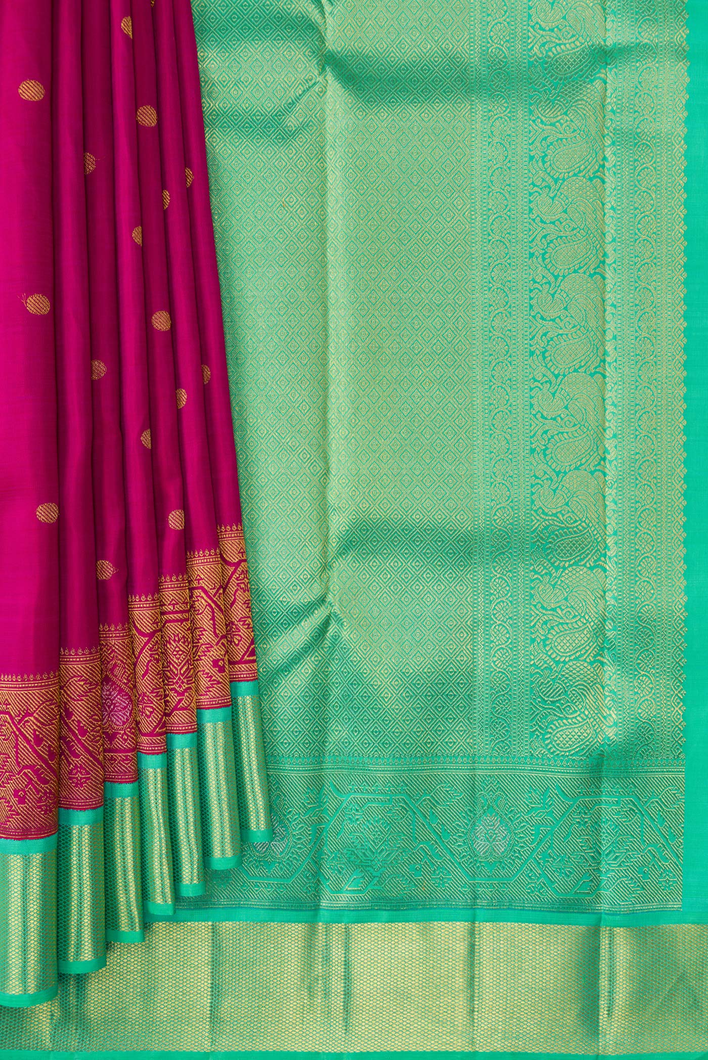 Pleats and pallu of Pure Silk Pure Zari Magenta Dual Tone Kanchipuram Saree with Zari Butta on the body and Fancy Border. 