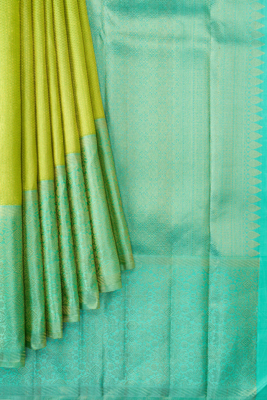 Pleats and pallu of Parrot Green Dual Tone Kanchipuram Silk Saree with Zari Brocade on the body and Zari Border. 