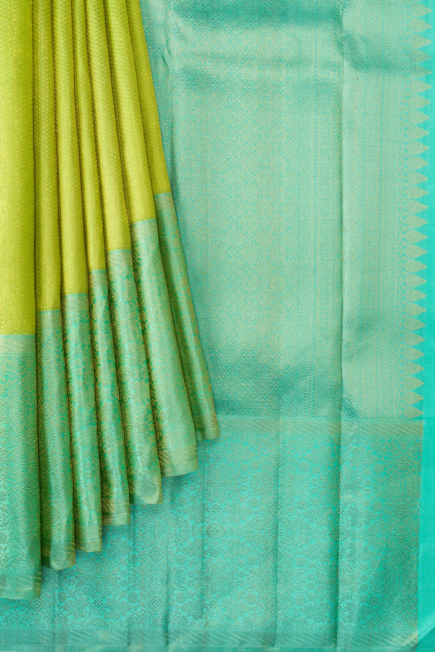 Pleats and pallu of Parrot Green Dual Tone Kanchipuram Silk Saree with Zari Brocade on the body and Zari Border. 