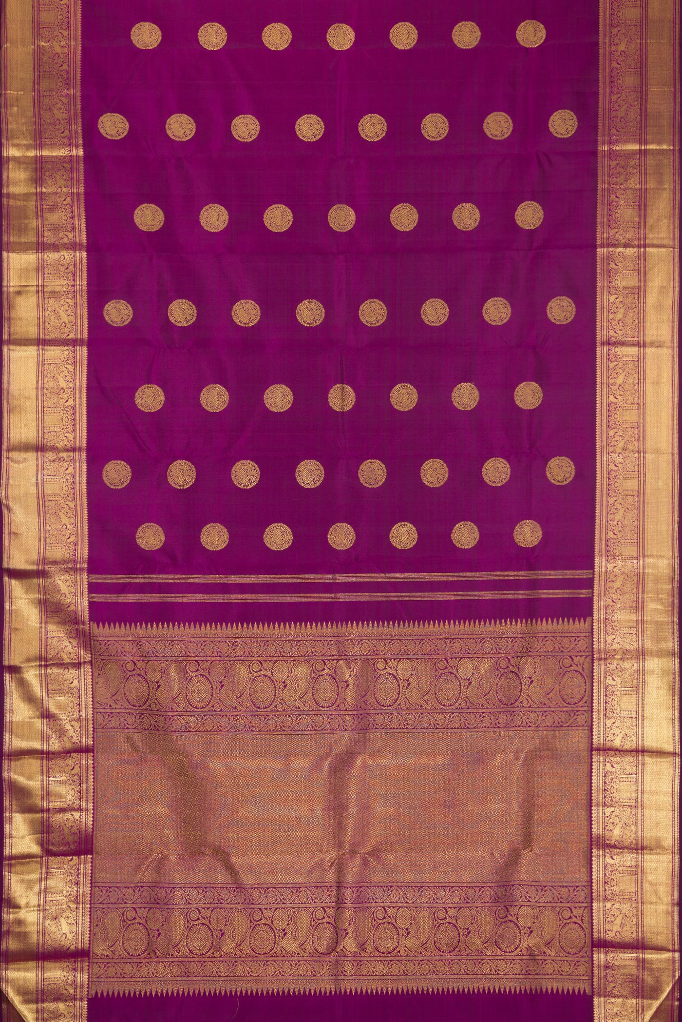 Flat view of Pure Silk Pure Zari Purple Dual Tone Kanjivaram Saree with Zari Butta on the body and Zari Border. 
