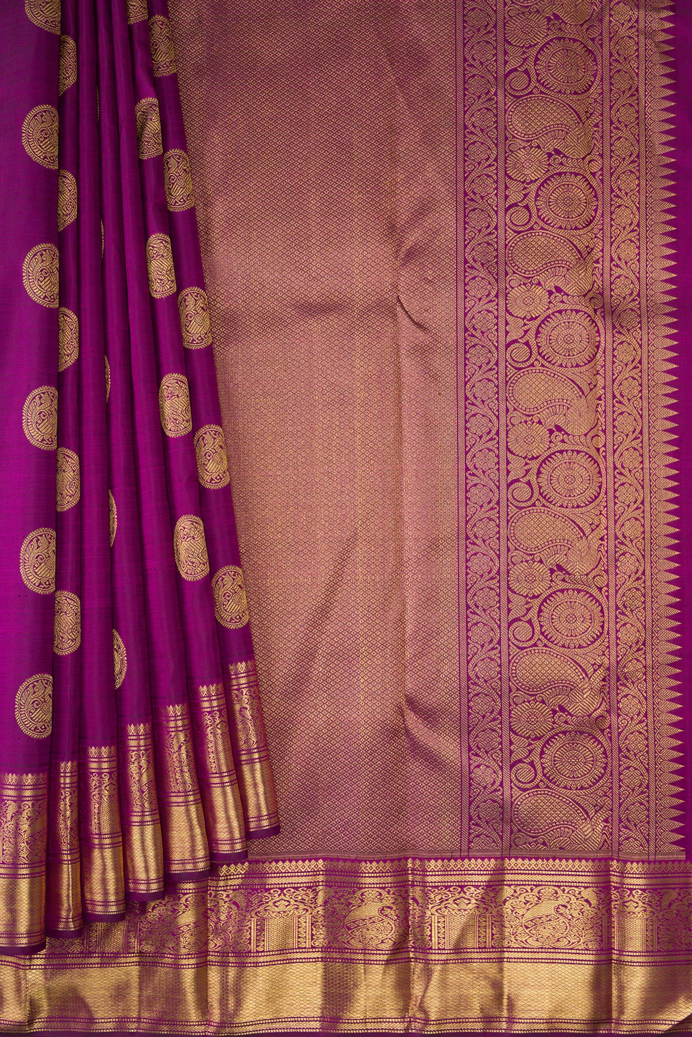 Pleats and pallu of Pure Silk Pure Zari Purple Dual Tone Kanjivaram Saree with Zari Butta on the body and Zari Border. 