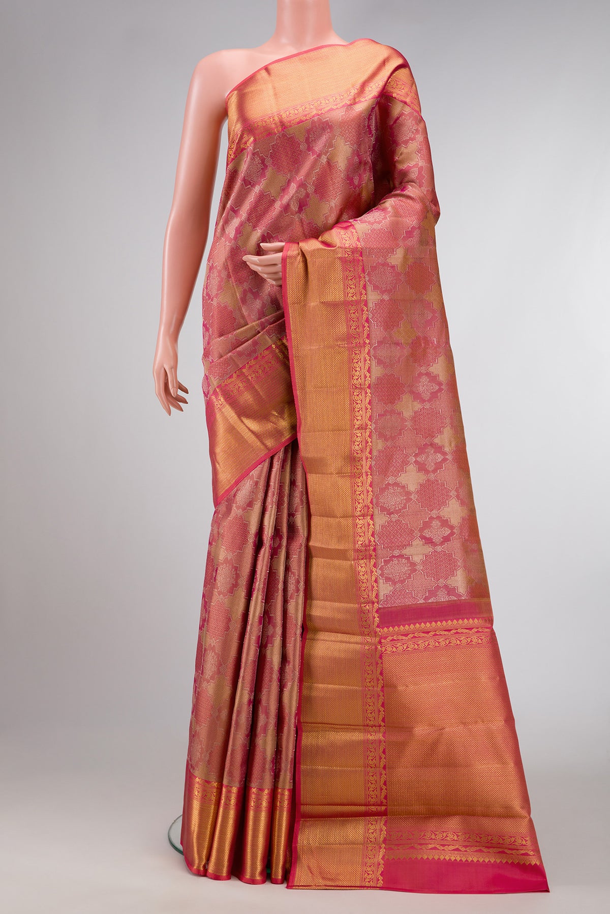 Dark Pink Dual Tone Kanjivaram Silk Saree with Jacquard With Zari Butta on the body and Zari Border.  displayed on a mannequin