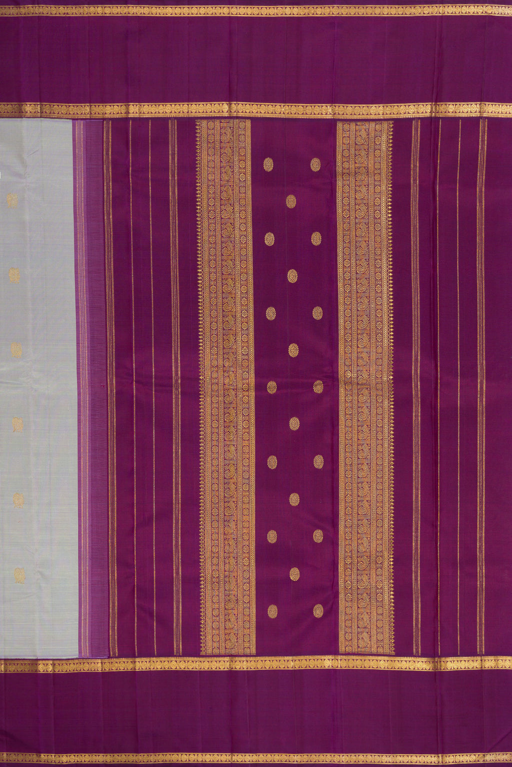 Close up image of the pallu of Pure Silk Pure Zari Light Blue Kanjivaram Saree with Zari Butta on the body and Zari Border. 