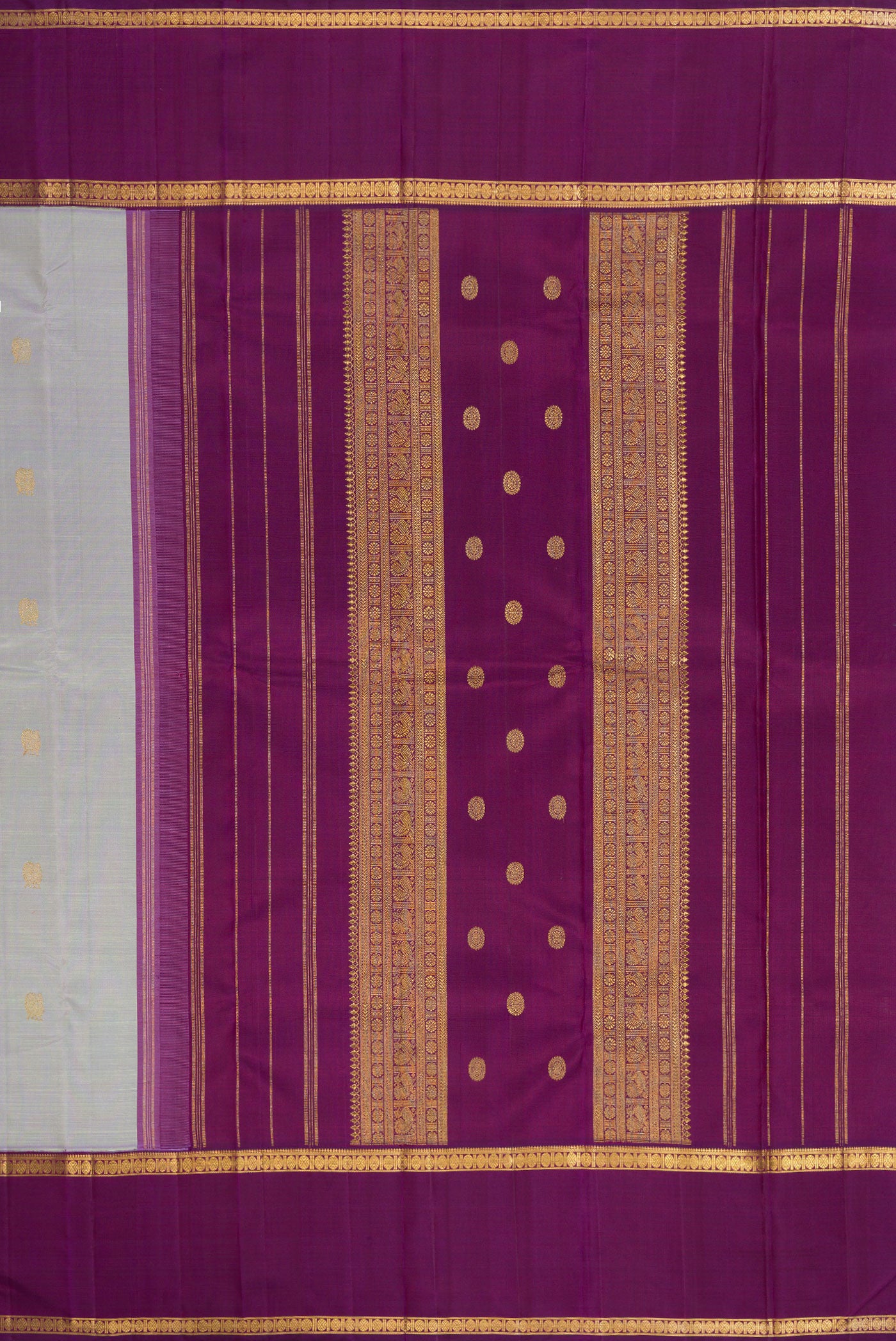 Close up image of the pallu of Pure Silk Pure Zari Light Blue Kanjivaram Saree with Zari Butta on the body and Zari Border. 