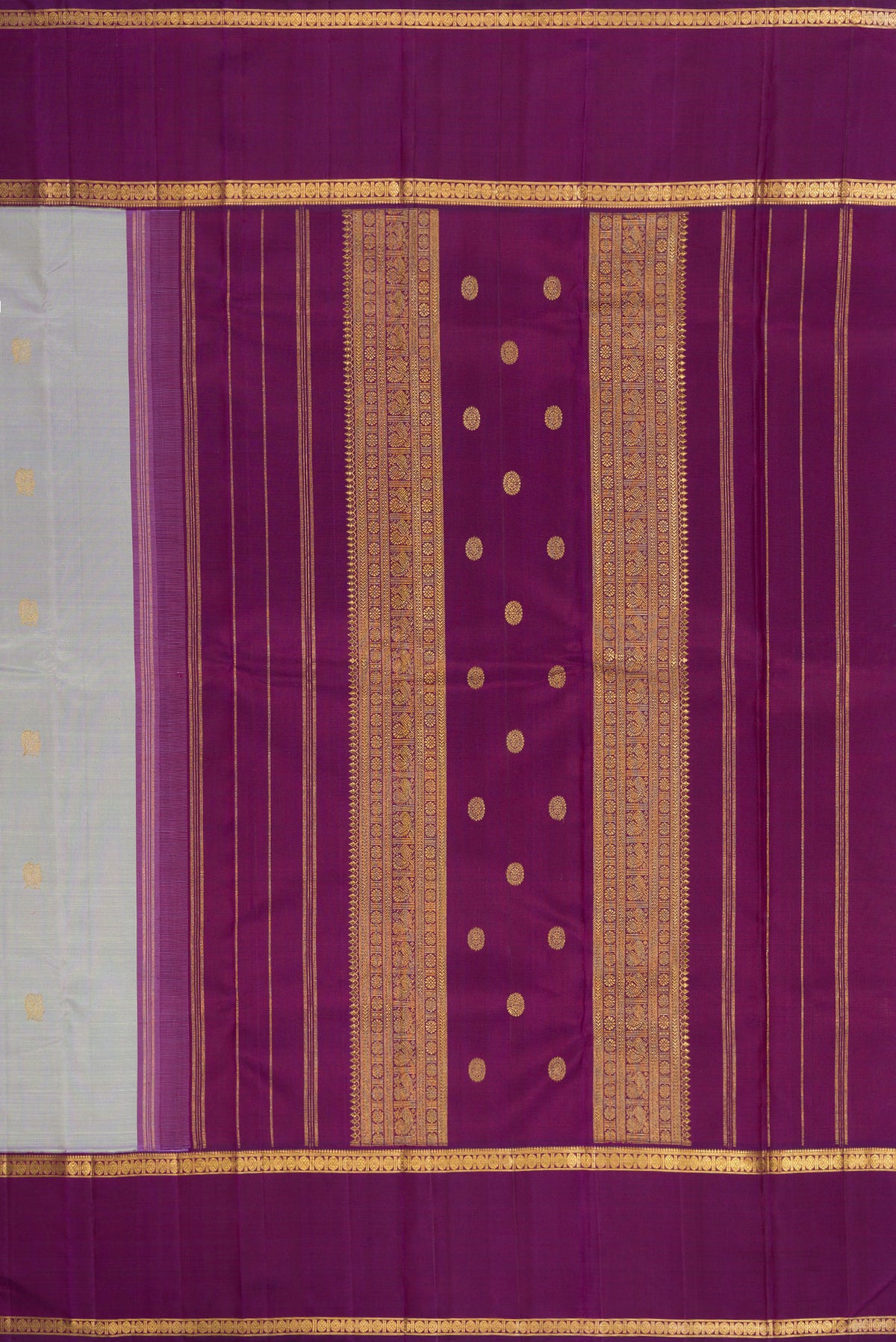 Close up image of the pallu of Pure Silk Pure Zari Light Blue Kanjivaram Saree with Zari Butta on the body and Zari Border. 