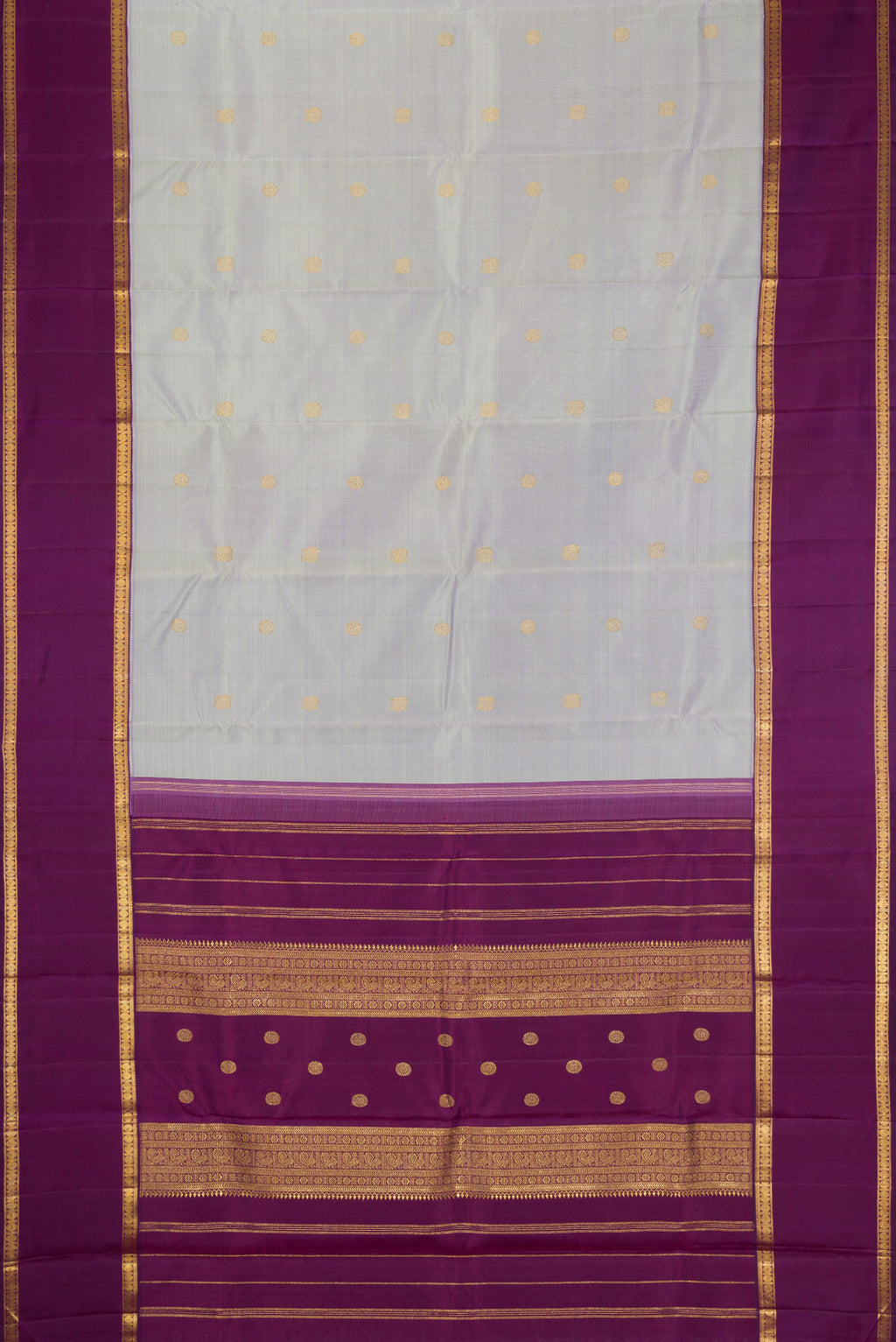 Flat view of Pure Silk Pure Zari Light Blue Kanjivaram Saree with Zari Butta on the body and Zari Border. 