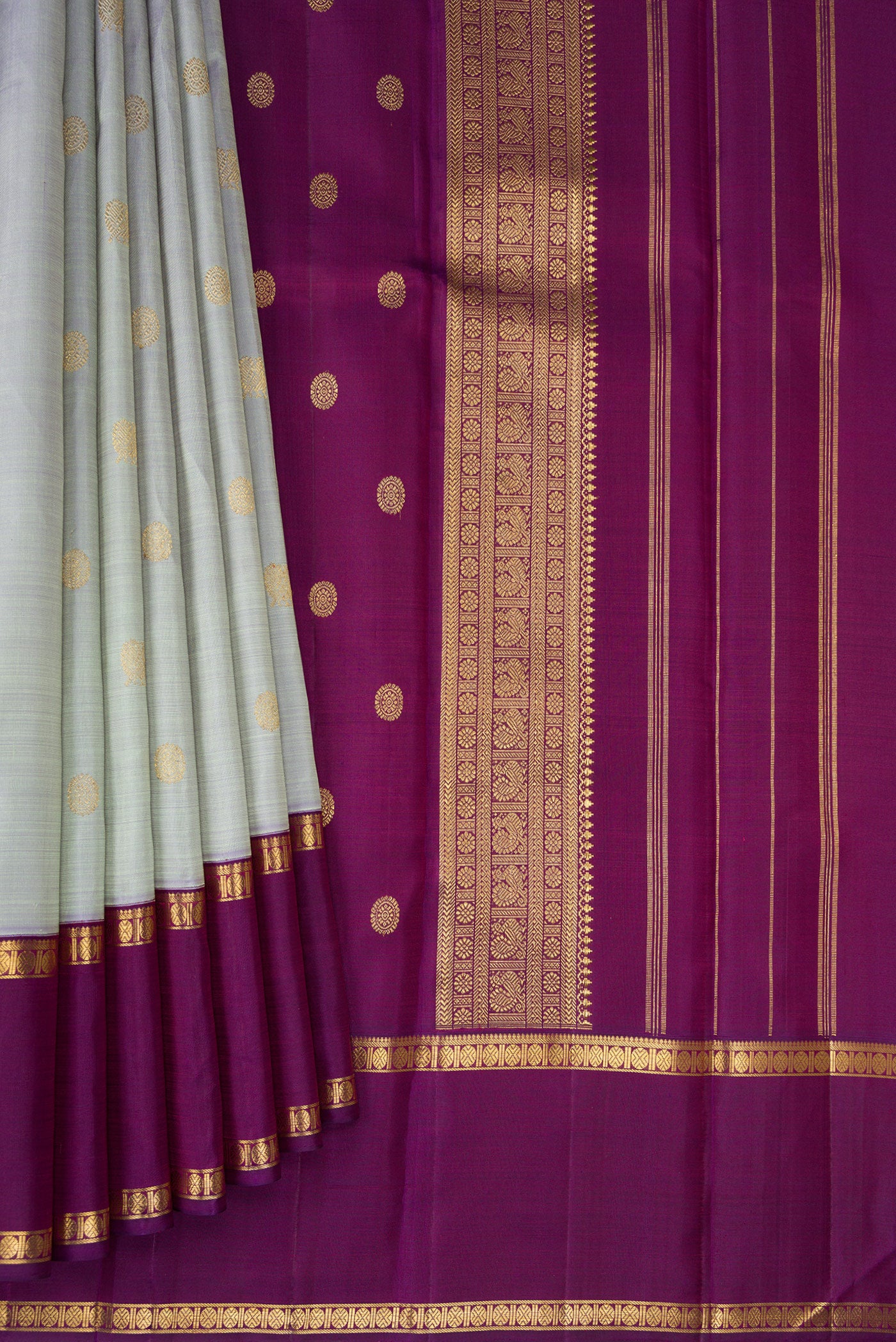 Pleats and pallu of Pure Silk Pure Zari Light Blue Kanjivaram Saree with Zari Butta on the body and Zari Border. 