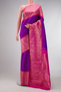 Pure Silk Pure Zari Purple Dual Tone Kanjivaram Saree with Zari Butta on the body and Fancy Border.  displayed on a mannequin