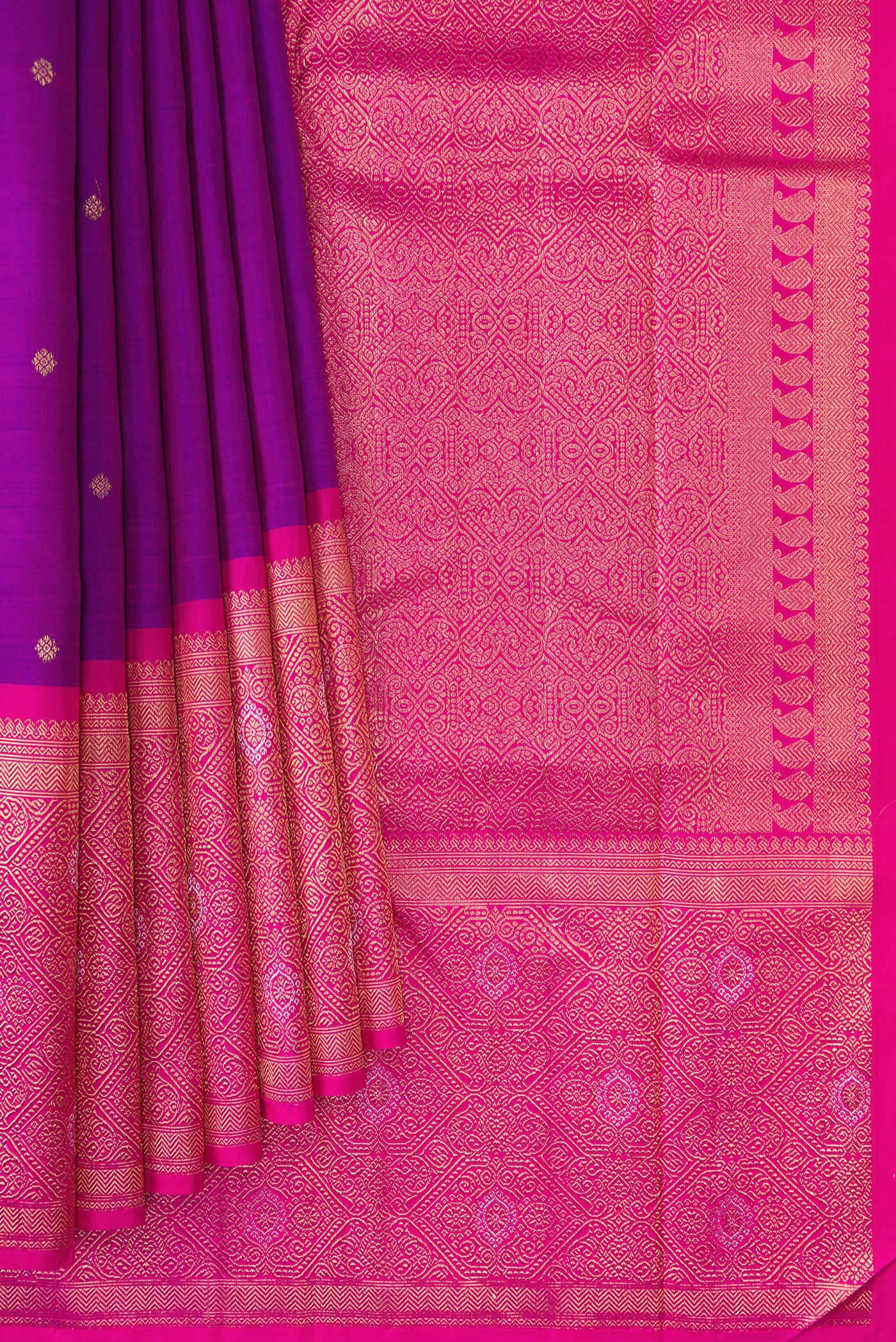 Pleats and pallu of Pure Silk Pure Zari Purple Dual Tone Kanjivaram Saree with Zari Butta on the body and Fancy Border. 