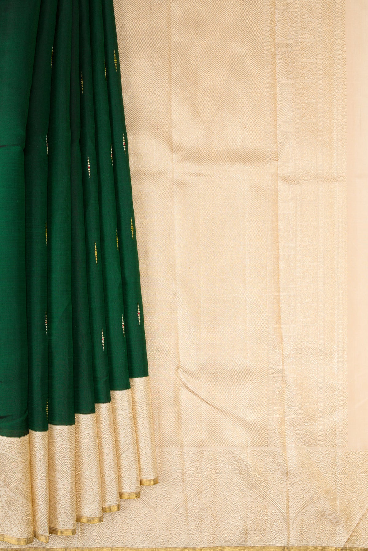 Pleats and pallu of Pure Silk Pure Zari Bottle Green Kanjivaram Saree with Zari Butta on the body and Zari Border. 