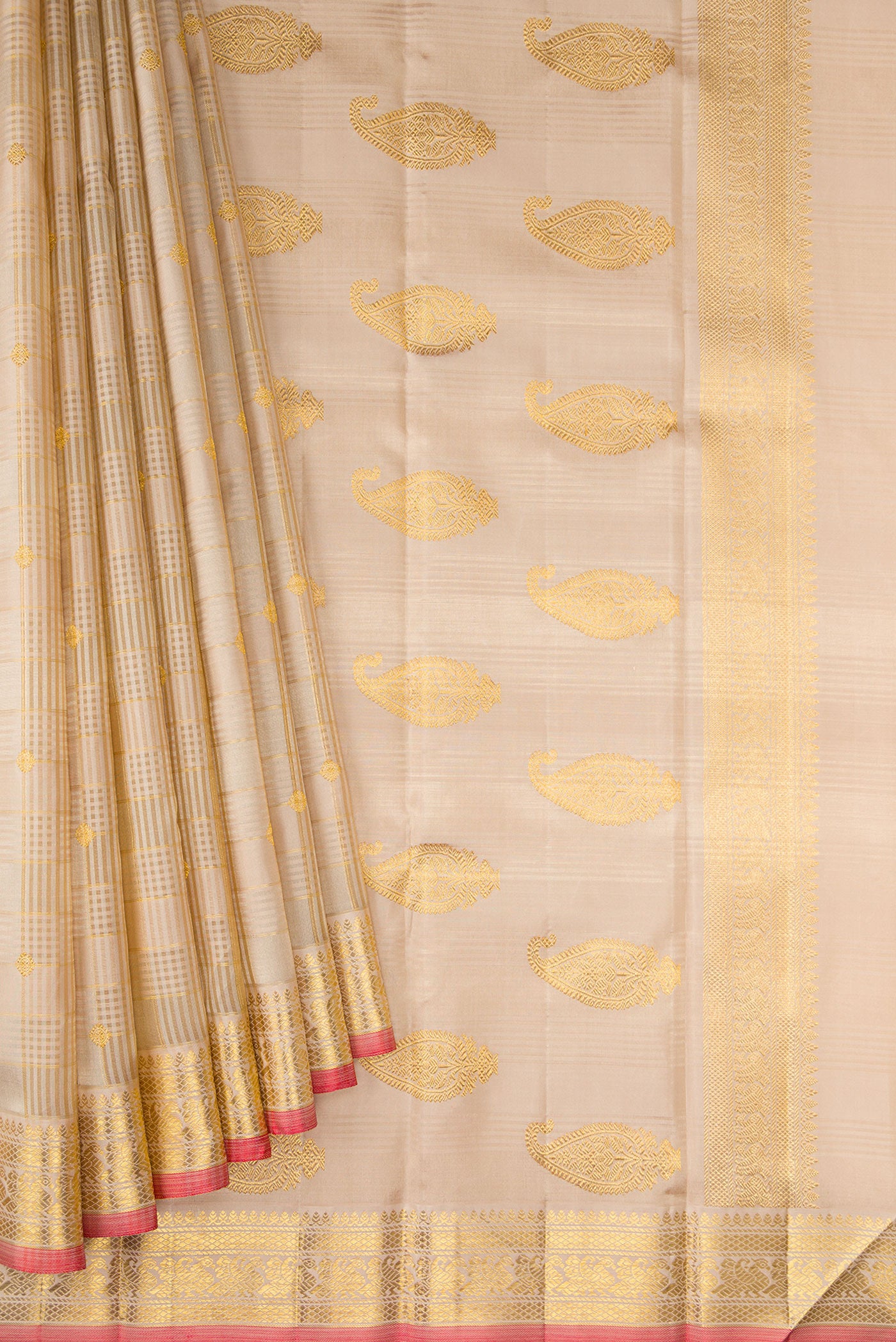 Pleats and pallu of Pure Silk Pure Zari Beige Kanchipuram Saree with Checked design on the body and Zari Border. 