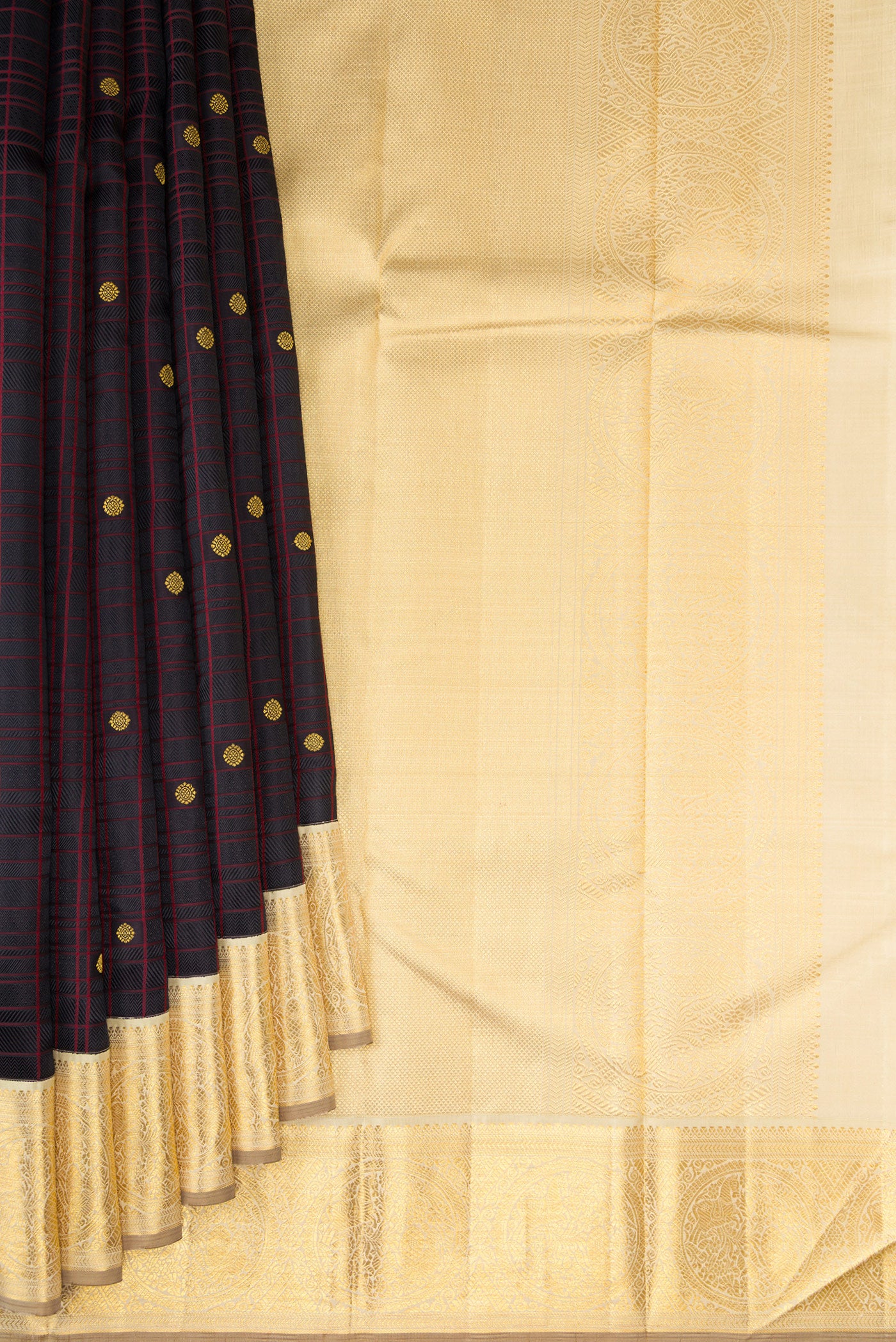 Pleats and pallu of Pure Silk Pure Zari Black Kanchipuram Saree with Checked design on the body and Zari Border. 