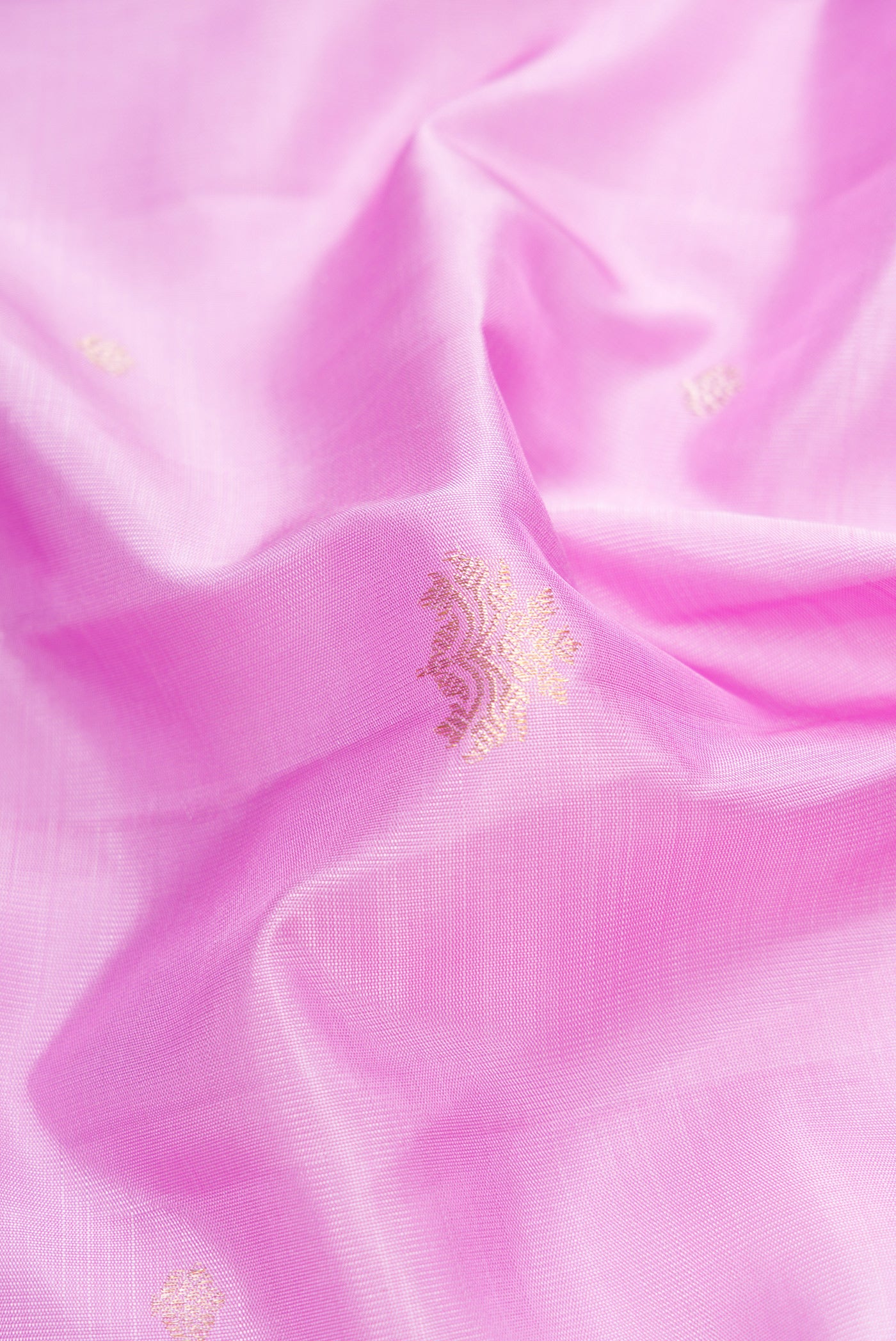Close up of Lavender Dual Tone Kanchipuram Silk Saree with Zari Butta on the body and Fancy Border.  displaying folds
