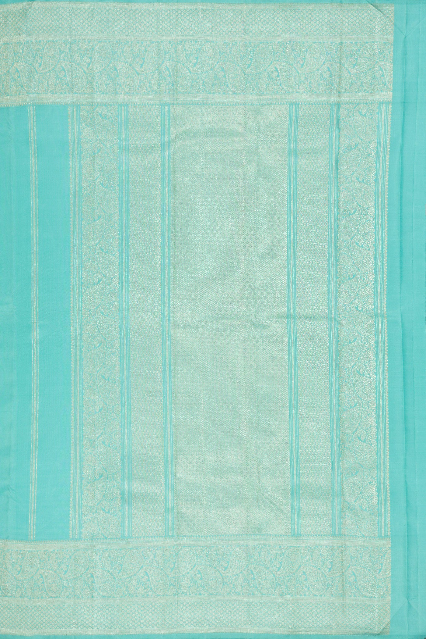 Close up image of the pallu of Sky Blue Dual Tone Kanjivaram Silk Saree with Zari Butta on the body and Fancy Border. 