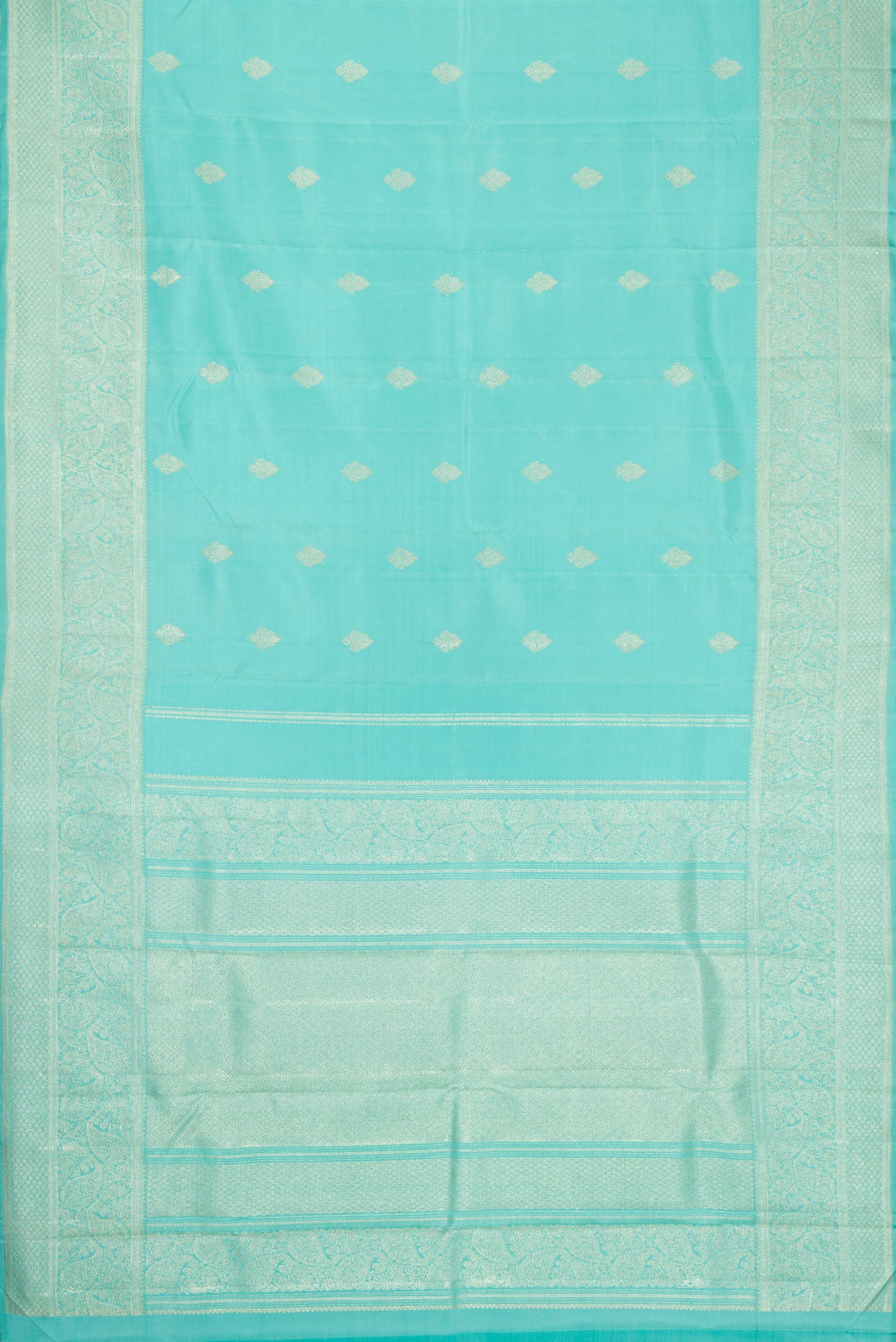 Flat view of Sky Blue Dual Tone Kanjivaram Silk Saree with Zari Butta on the body and Fancy Border. 