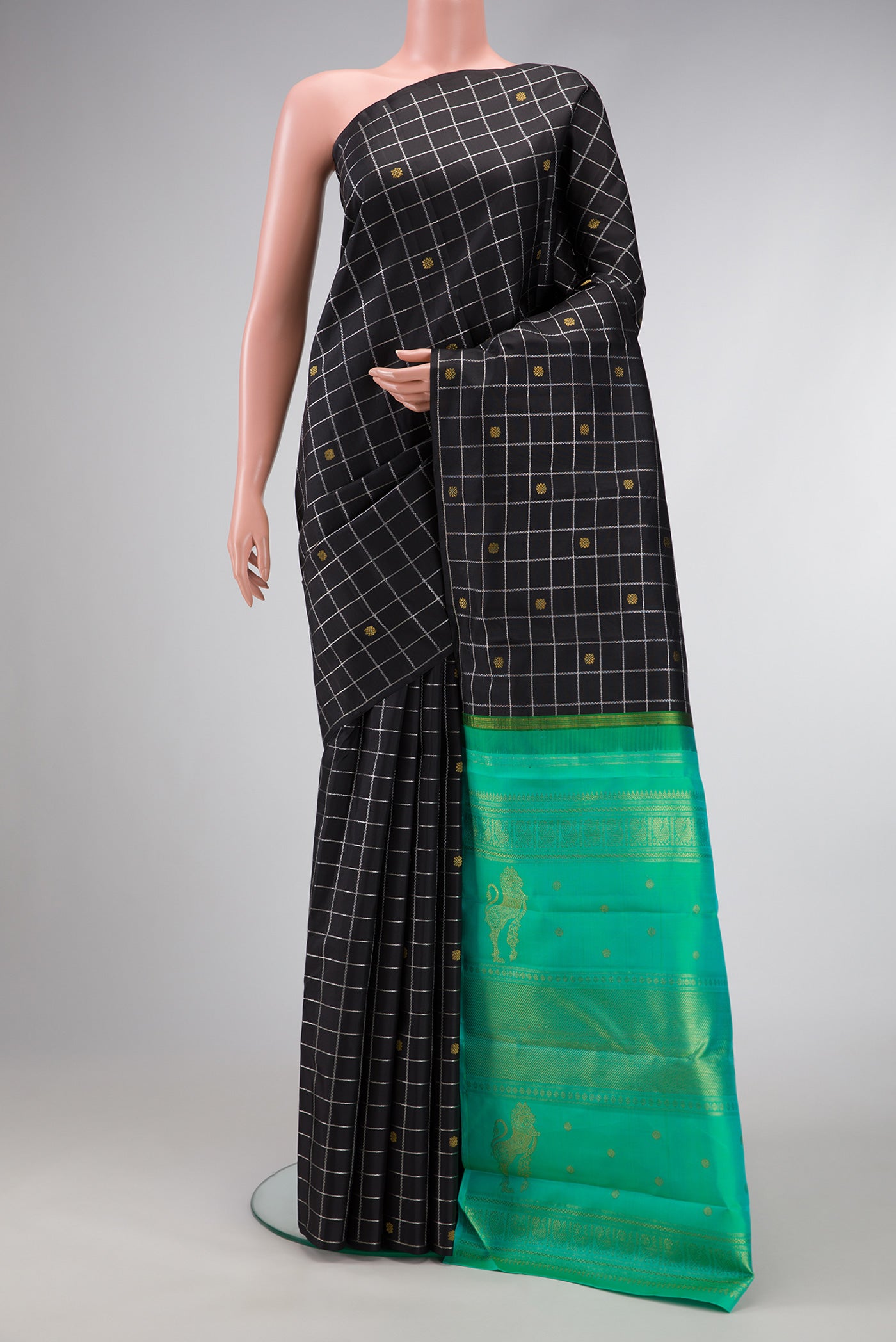 Pure Silk Pure Zari Black Dual Tone Kanjivaram Saree with Checked design on the body and Without Border.  displayed on a mannequin