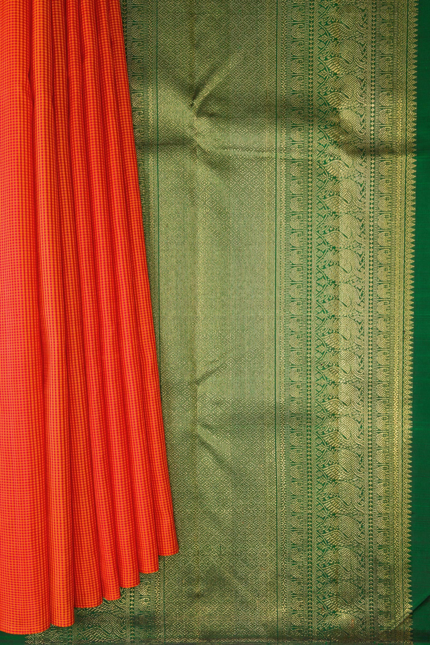 Pleats and pallu of Pure Silk Pure Zari Orange Kanchipuram Saree with Checked design on the body and Without Border. 