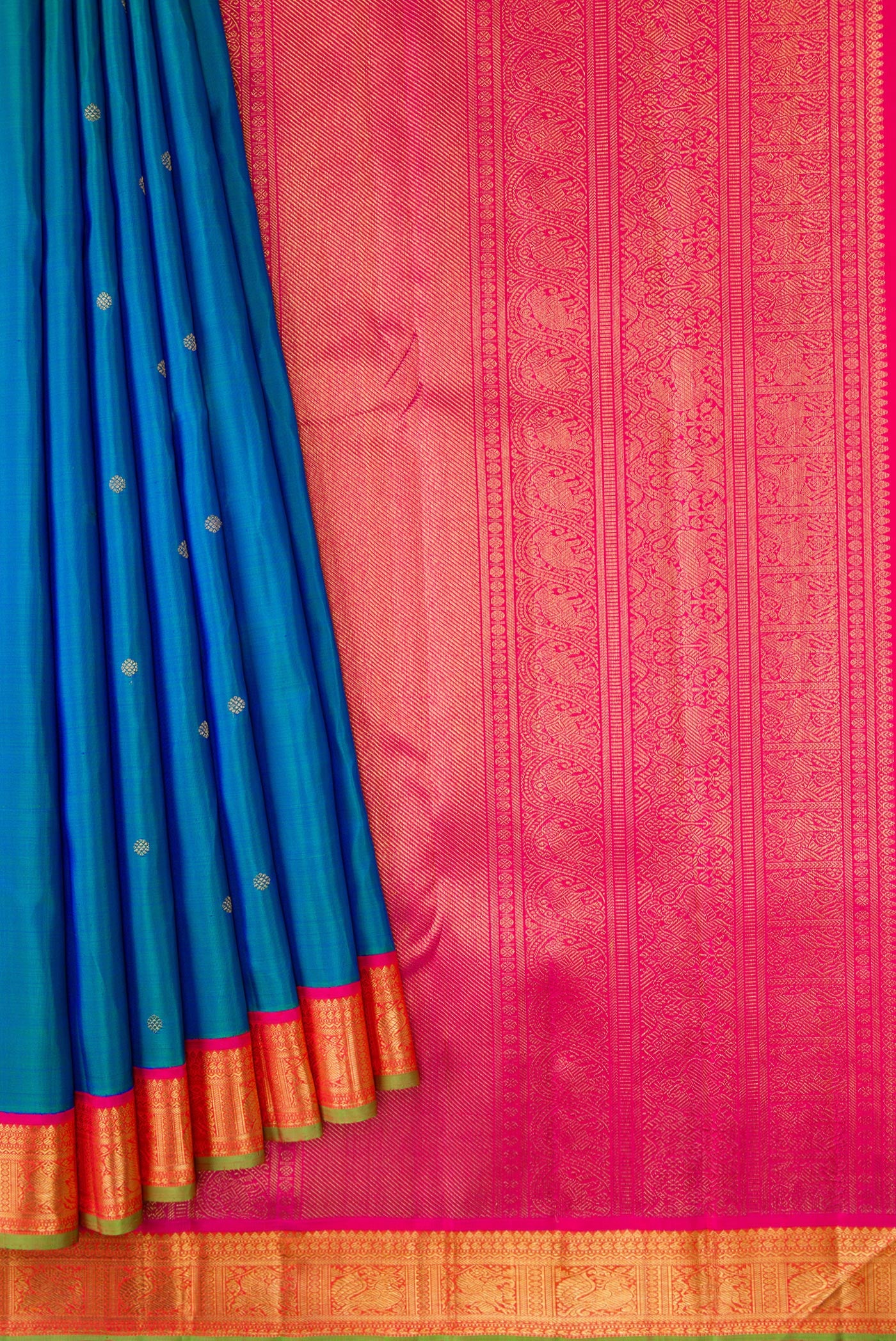 Pleats and pallu of Pure Silk Pure Zari Peacock Blue Dual Tone Kanjivaram Saree with Zari Butta on the body and Zari Border. 