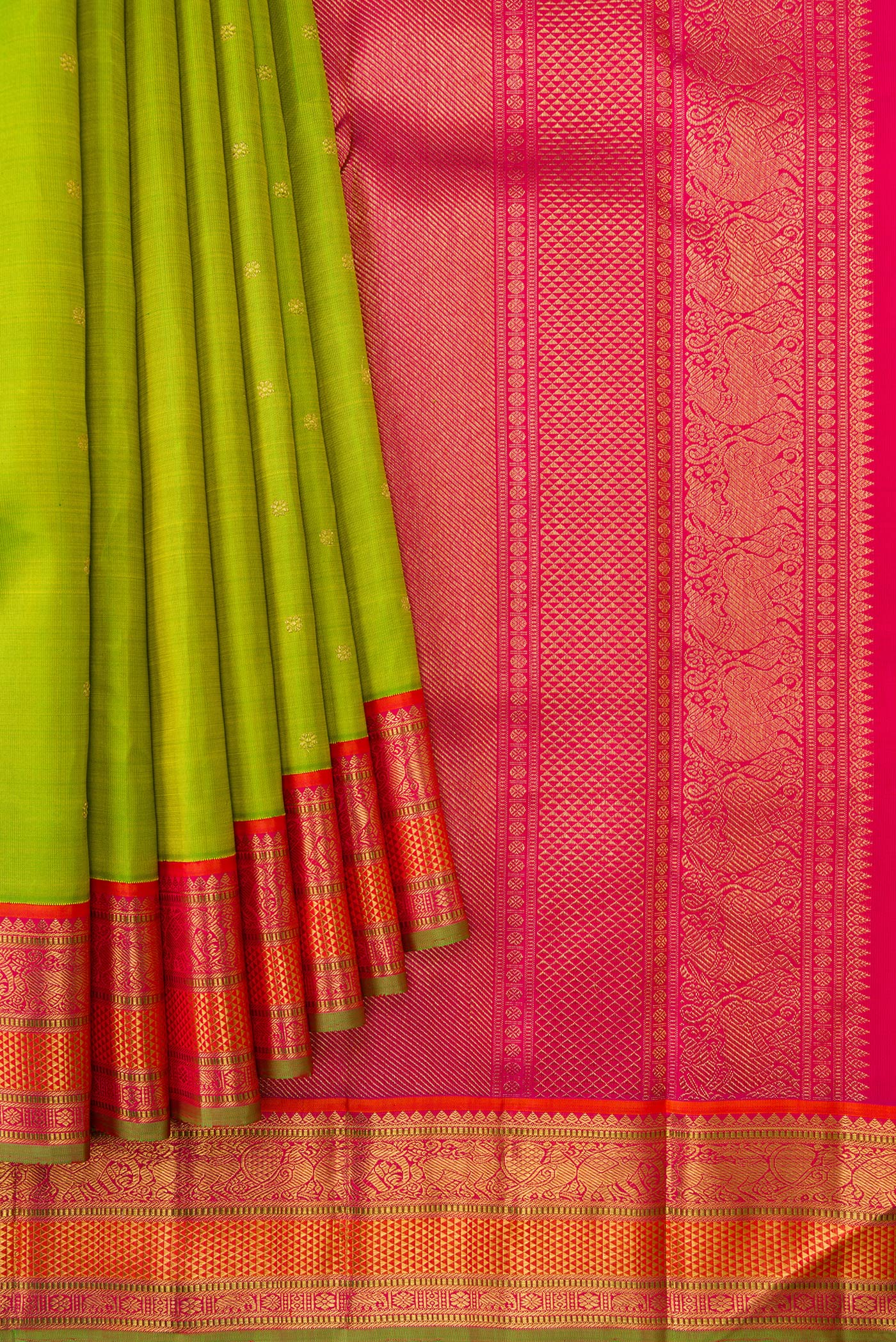 Pleats and pallu of Pure Silk Pure Zari Parrot Green Dual Tone Kanjivaram Saree with Zari Butta on the body and Zari Border. 