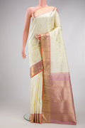 Pure Silk Pure Zari Off White Kanjivaram Saree with Zari Butta on the body and Zari Border.  displayed on a mannequin