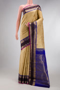 Pure Silk Pure Zari Beige Kanjivaram Saree with Zari Butta on the body and Zari Border.  displayed on a mannequin
