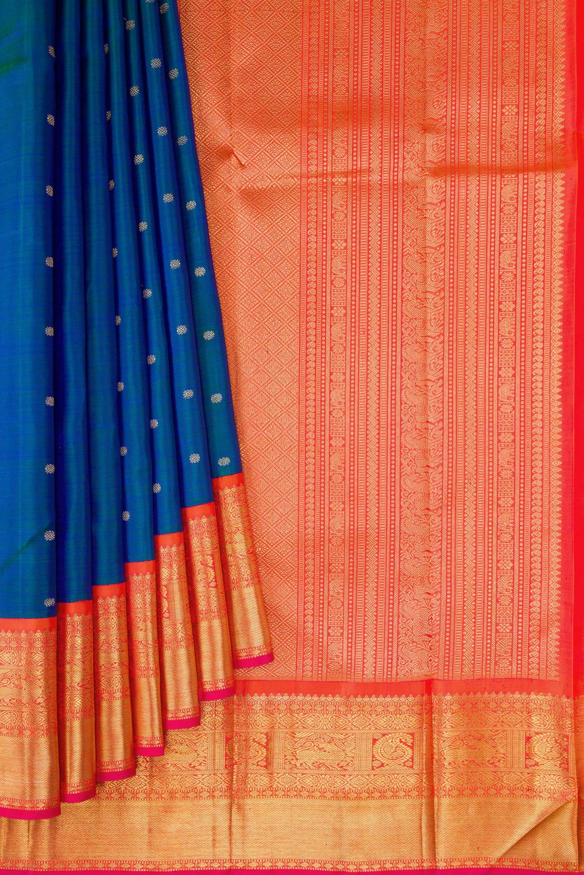 Pleats and pallu of Pure Silk Pure Zari Peacock Blue Dual Tone Kanjivaram Saree with Zari Butta on the body and Zari Border. 
