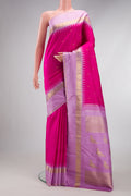 Pure Silk Pure Zari Dark Pink Kanjivaram Saree with Zari Butta on the body and Fancy Border.  displayed on a mannequin