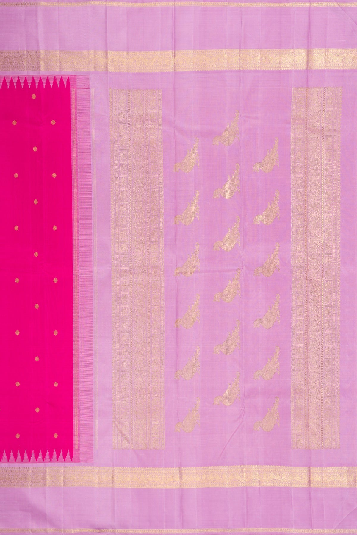 Close up image of the pallu of Pure Silk Pure Zari Dark Pink Kanjivaram Saree with Zari Butta on the body and Fancy Border. 