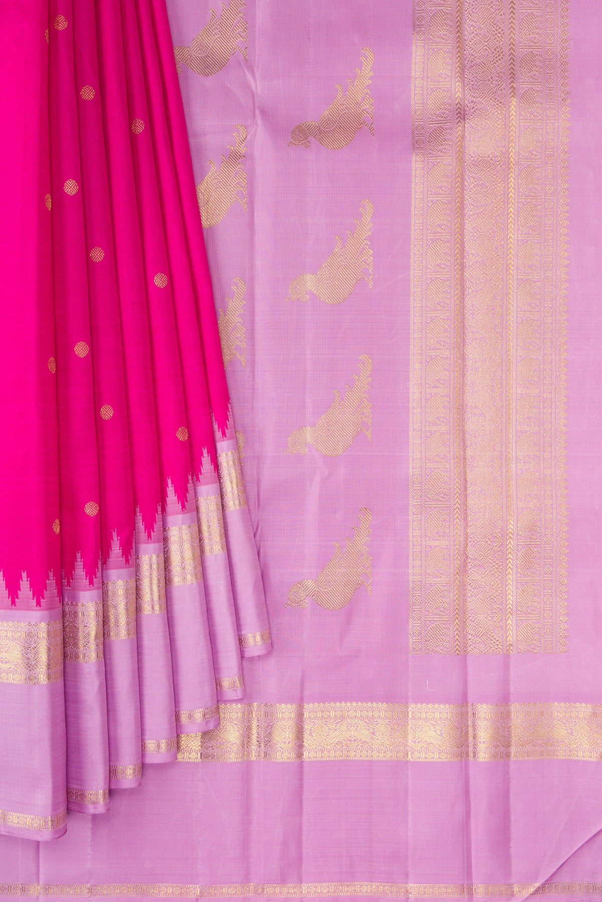 Pleats and pallu of Pure Silk Pure Zari Dark Pink Kanjivaram Saree with Zari Butta on the body and Fancy Border. 