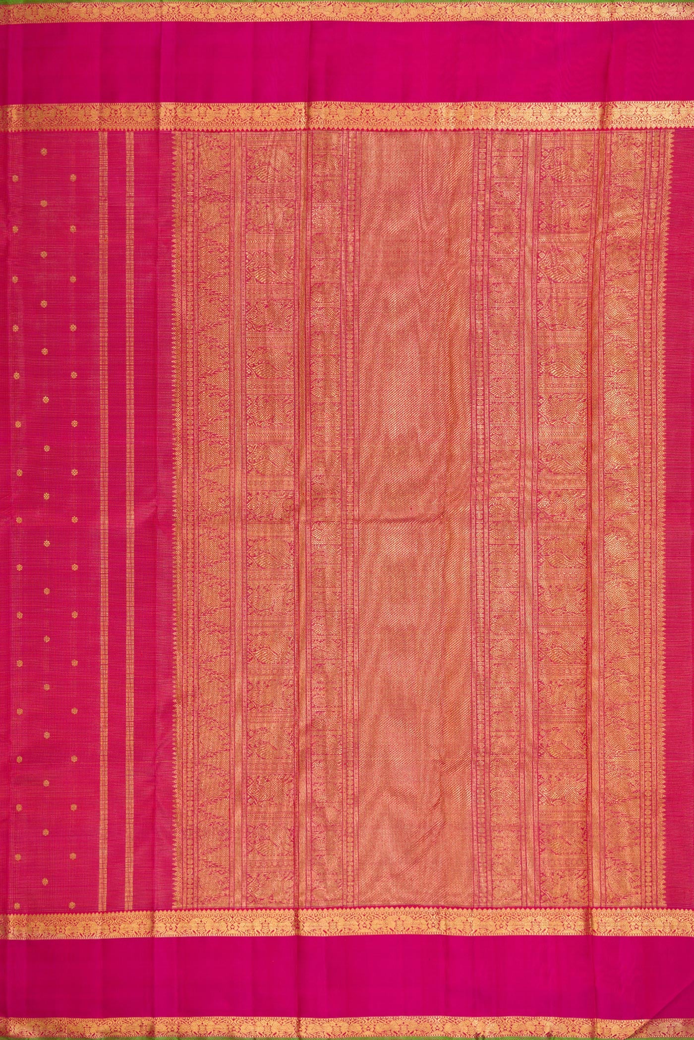 Close up image of the pallu of Pure Silk Pure Zari Rani Pink Kanjivaram Saree with Zari Butta on the body and Zari Border. 