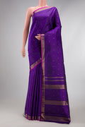 Pure Silk Pure Zari Violet Dual Tone Kanjivaram Saree with Stripes on the body and Zari Border.  displayed on a mannequin