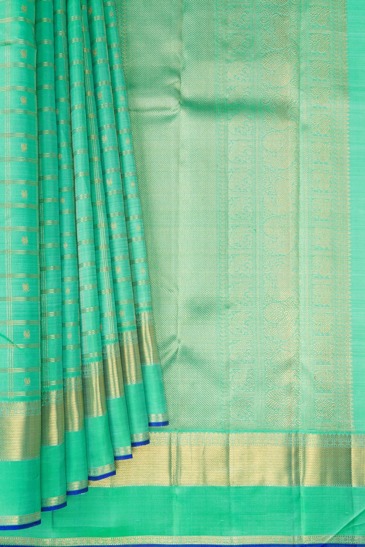 Pleats and pallu of Pure Silk Pure Zari Sea Green Dual Tone Kanjivaram Saree with Checked design on the body and Zari Border. 