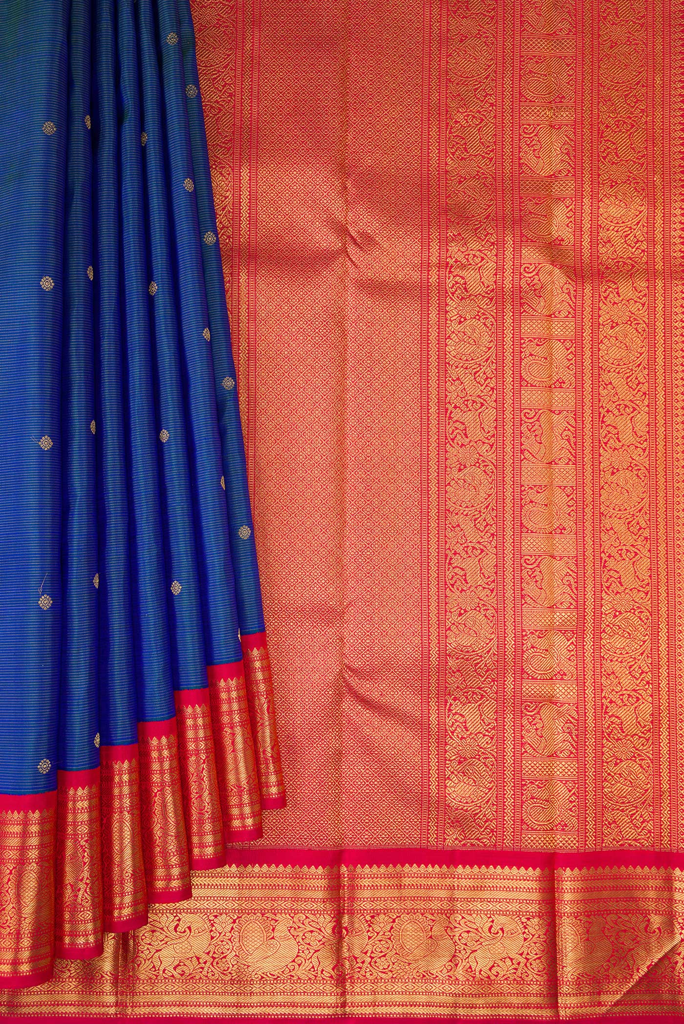 Pleats and pallu of Pure Silk Pure Zari Peacock Blue Dual Tone Kanjivaram Saree with Zari Butta on the body and Zari Border. 