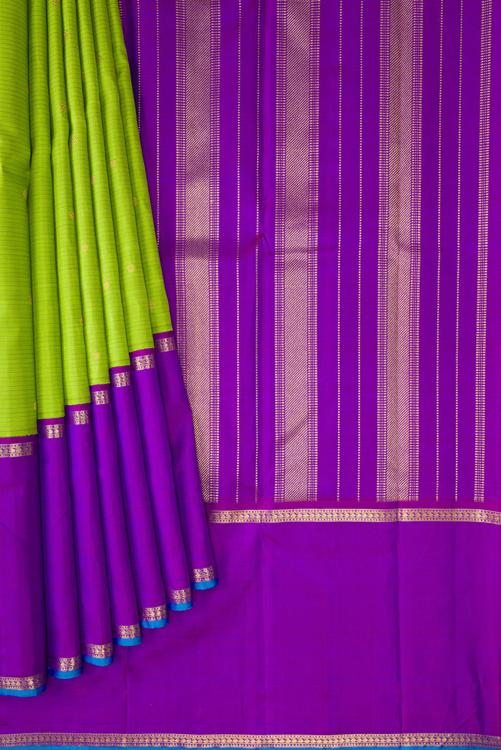 Pleats and pallu of Pure Silk Pure Zari Parrot Green Dual Tone Kanchipuram Saree with Stripes on the body and Zari Border. 