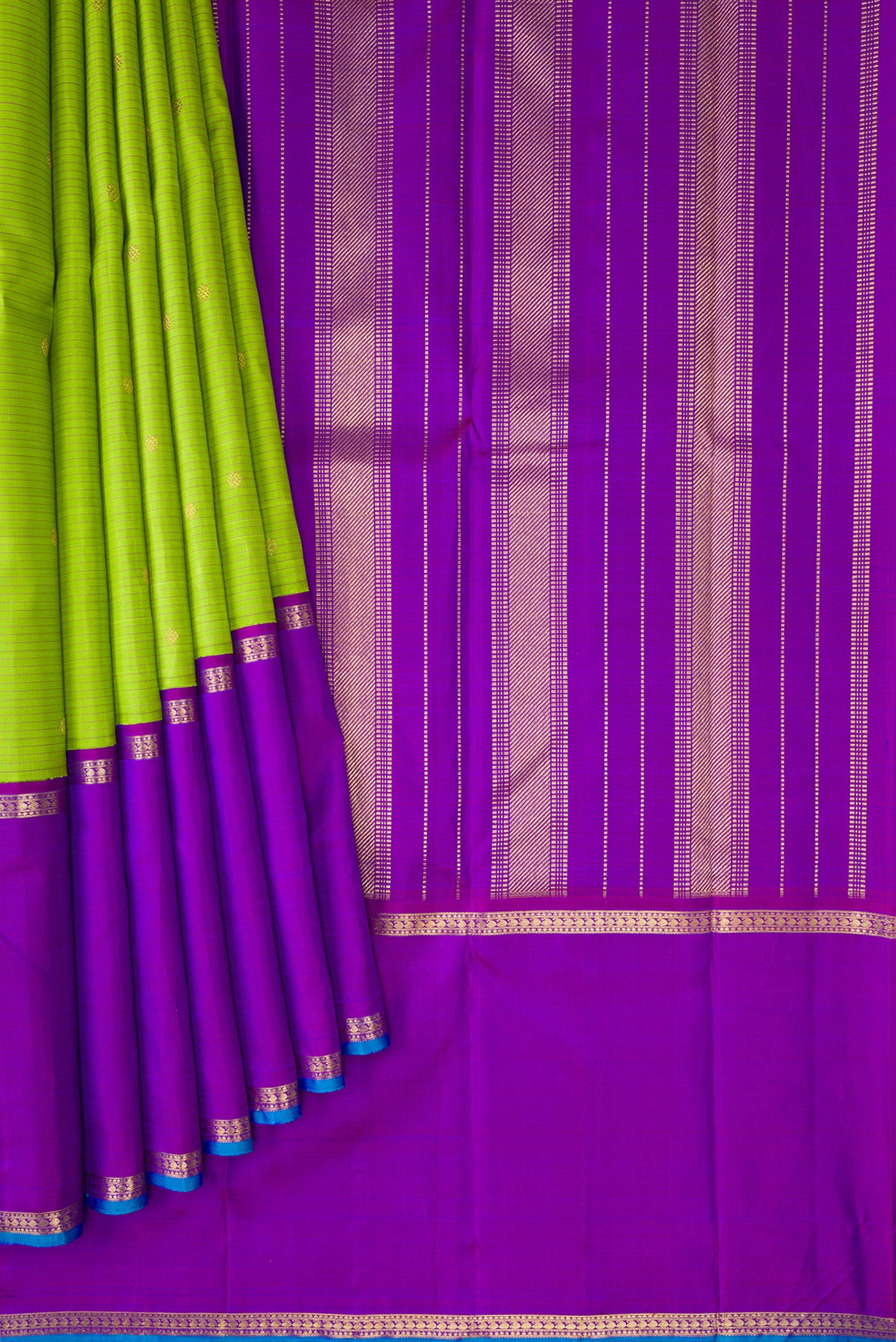 Pleats and pallu of Pure Silk Pure Zari Parrot Green Dual Tone Kanchipuram Saree with Stripes on the body and Zari Border. 