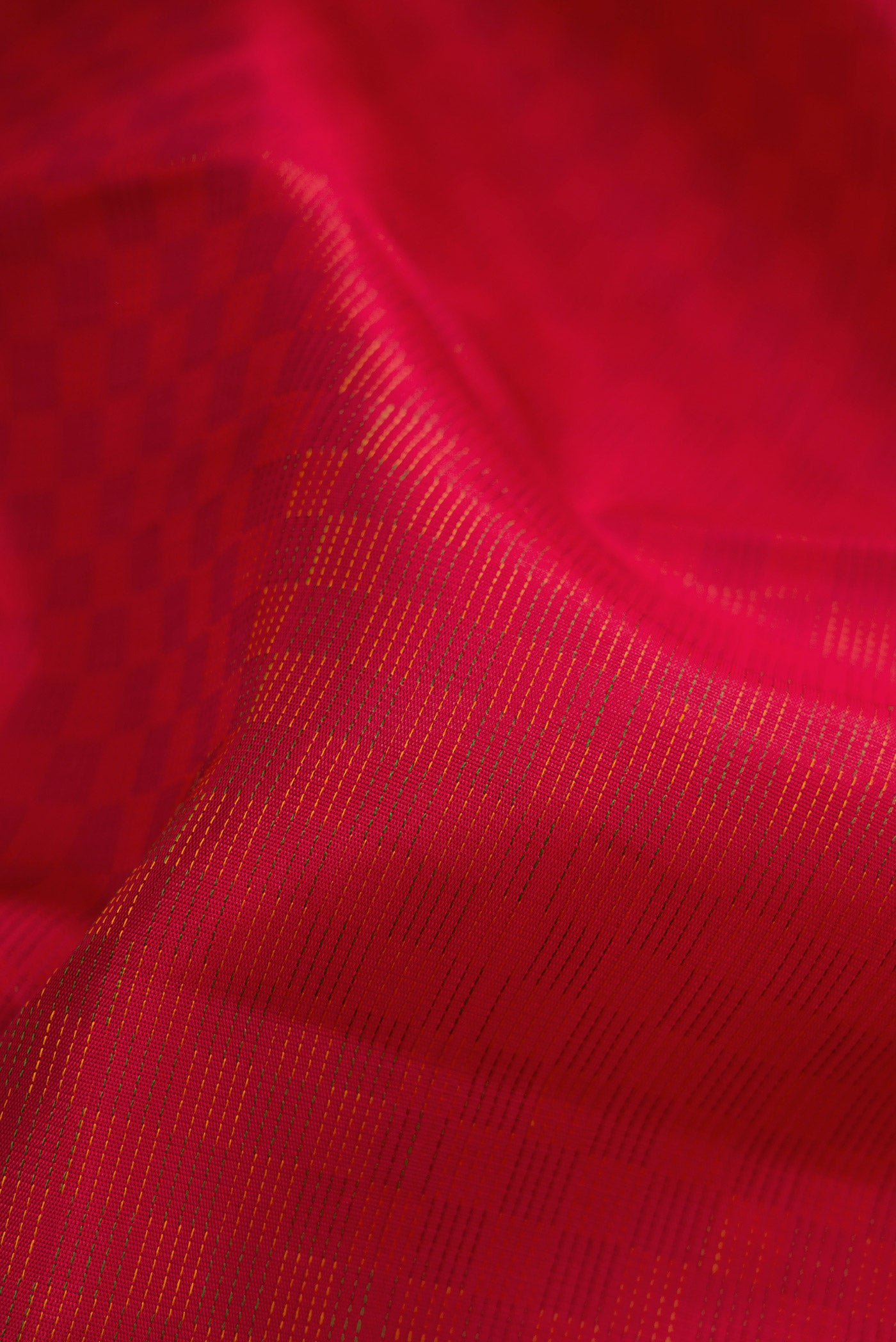 Close up of Pure Silk Pure Zari Maroon Dual Tone Kanjivaram Saree with Jacquard design on the body and Zari Border.  displaying folds