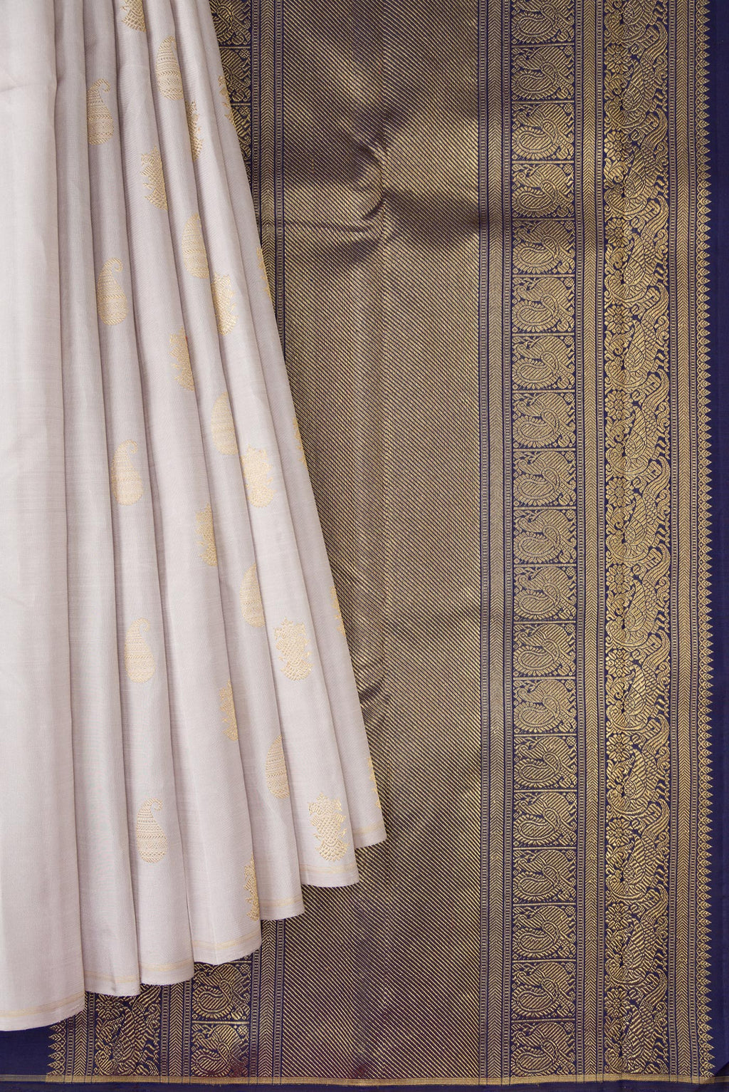 Pleats and pallu of Pure Silk Pure Zari Grey Kanchipuram Saree with Zari Butta on the body and Thin Zari Line. 