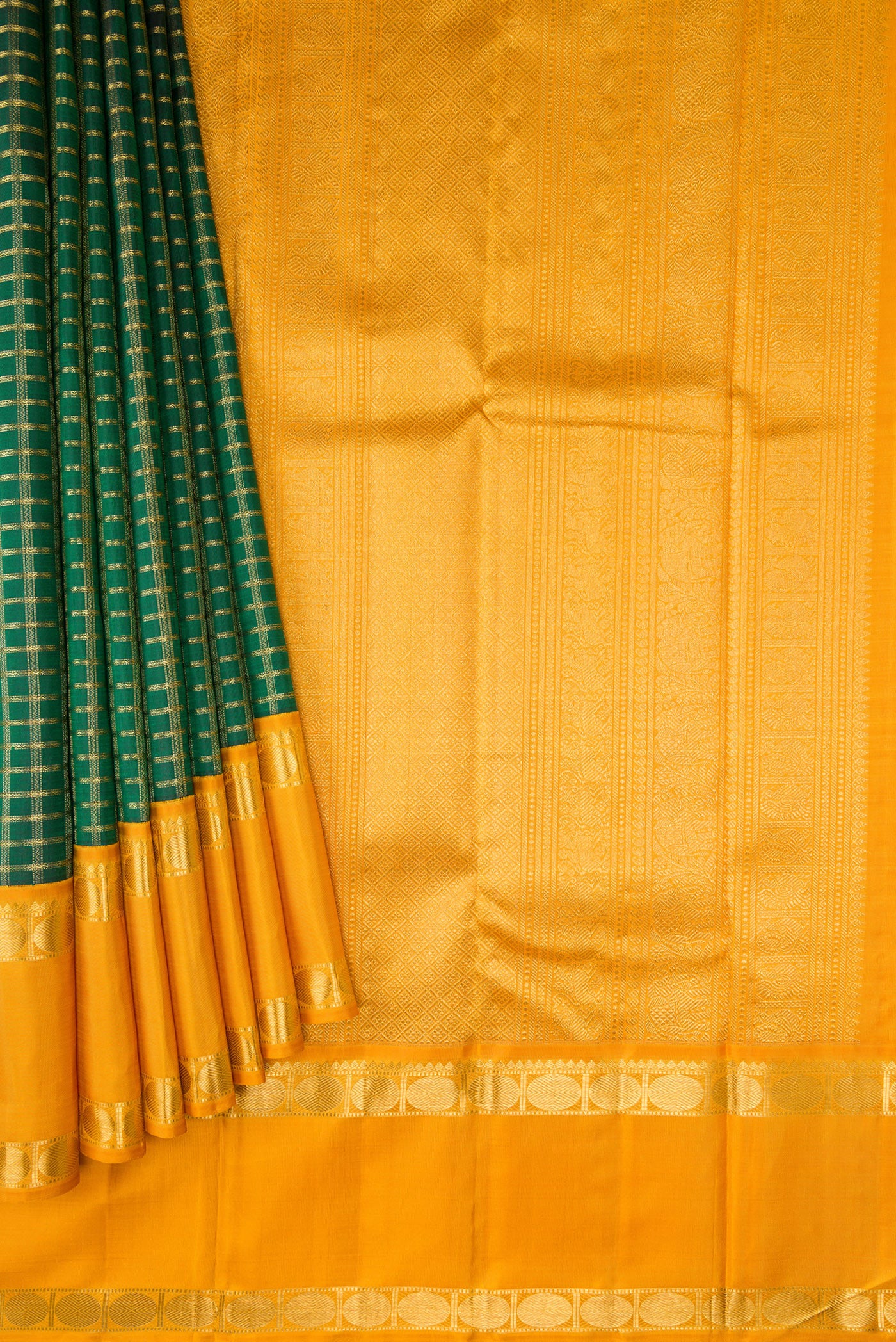 Pleats and pallu of Pure Silk Pure Zari Bottle Green Dual Tone Kanjivaram Saree with Zari Brocade on the body and Zari Border. 
