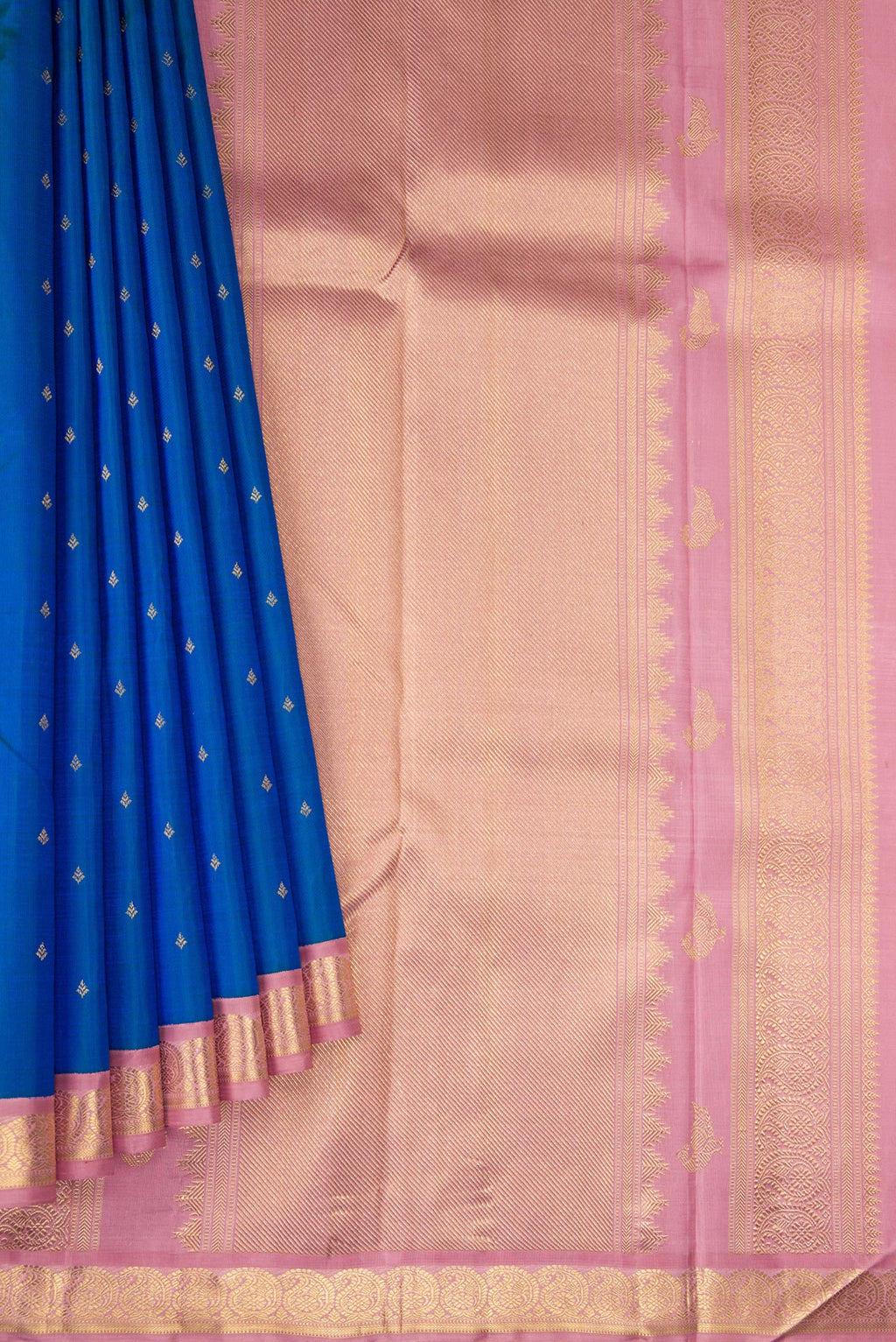 Pleats and pallu of Pure Silk Pure Zari Peacock Blue Dual Tone Kanjivaram Saree with Zari Butta on the body and Zari Border. 