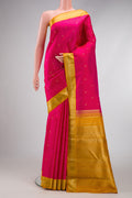 Pure Silk Pure Zari Pink Dual Tone Kanjivaram Saree with Zari Butta on the body and Zari Border.  displayed on a mannequin