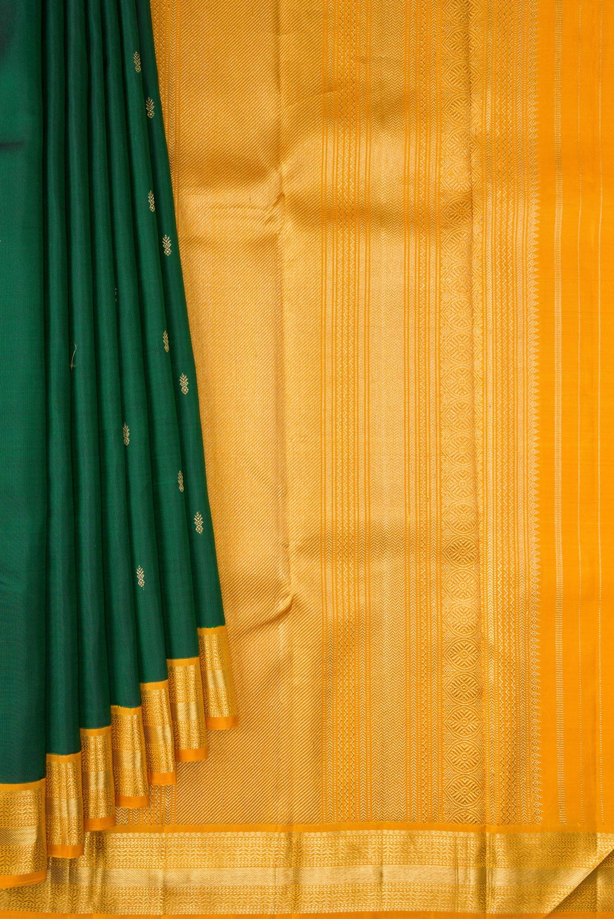 Pleats and pallu of Pure Silk Pure Zari Bottle Green Kanjivaram Saree with Zari Butta on the body and Zari Border. 