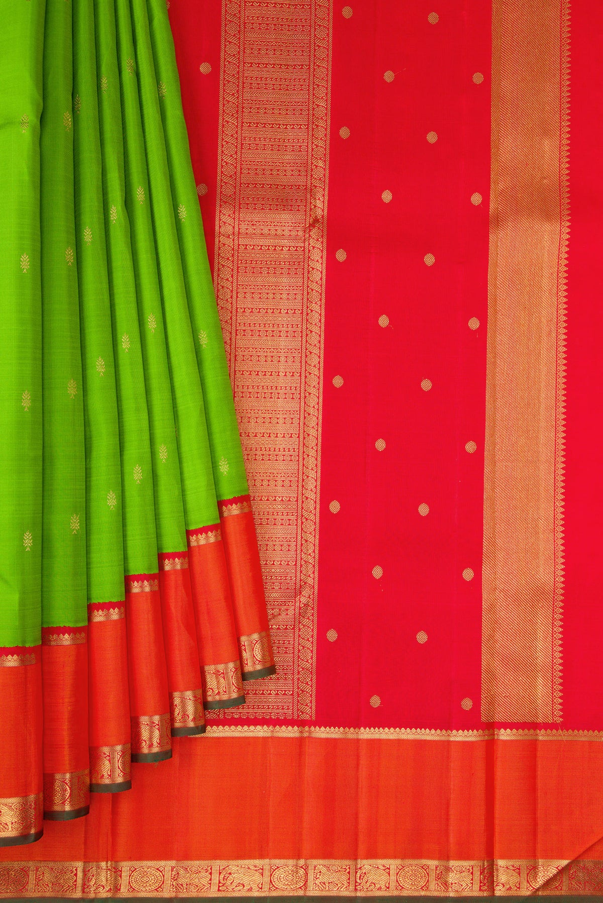 Pleats and pallu of Pure Silk Pure Zari Parrot Green Dual Tone Kanjivaram Saree with Zari Butta on the body and Zari Border. 