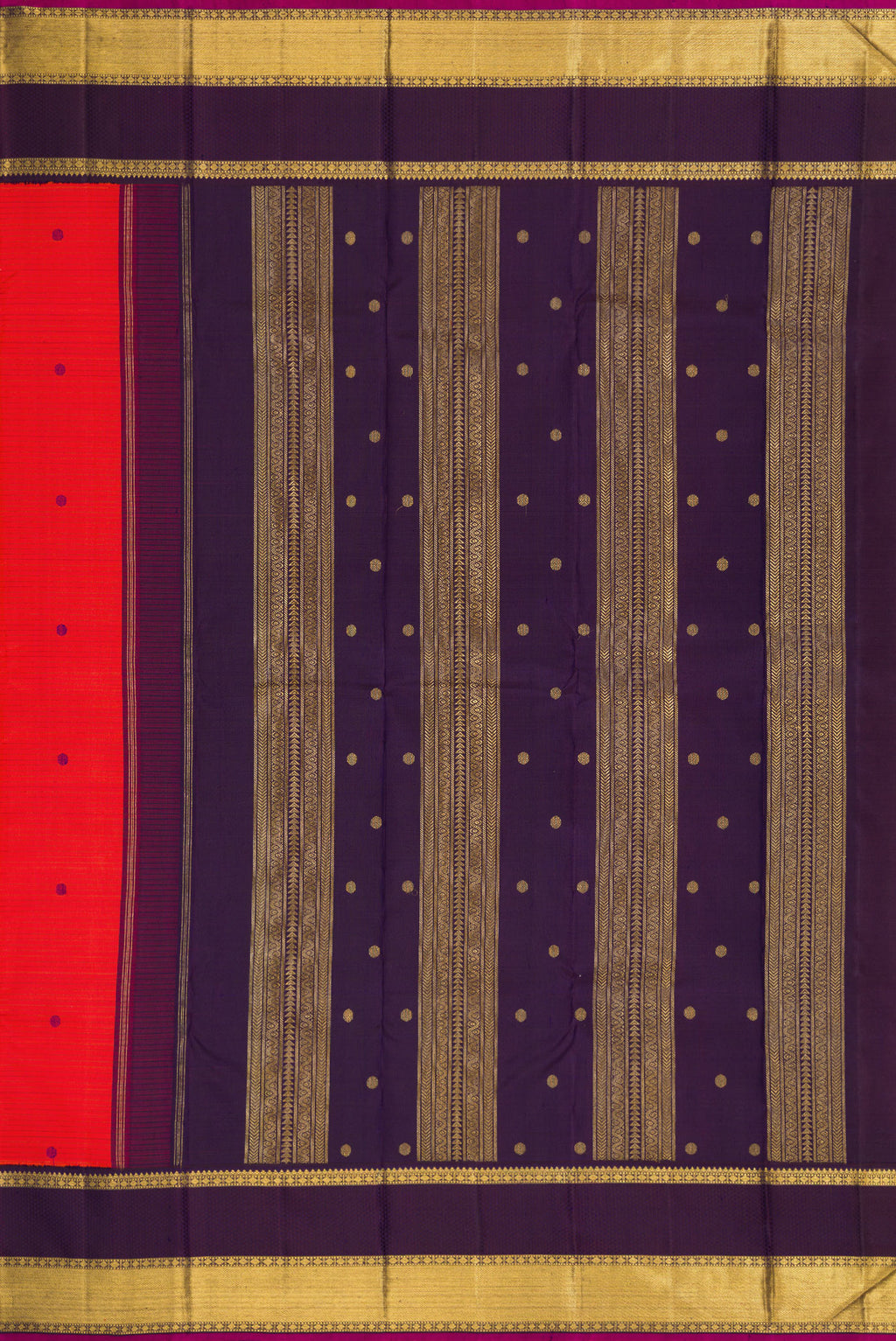 Close up image of the pallu of Pure Silk Pure Zari Orange Dual Tone Kanjivaram Saree with Thread Butta on the body and Zari Border. 