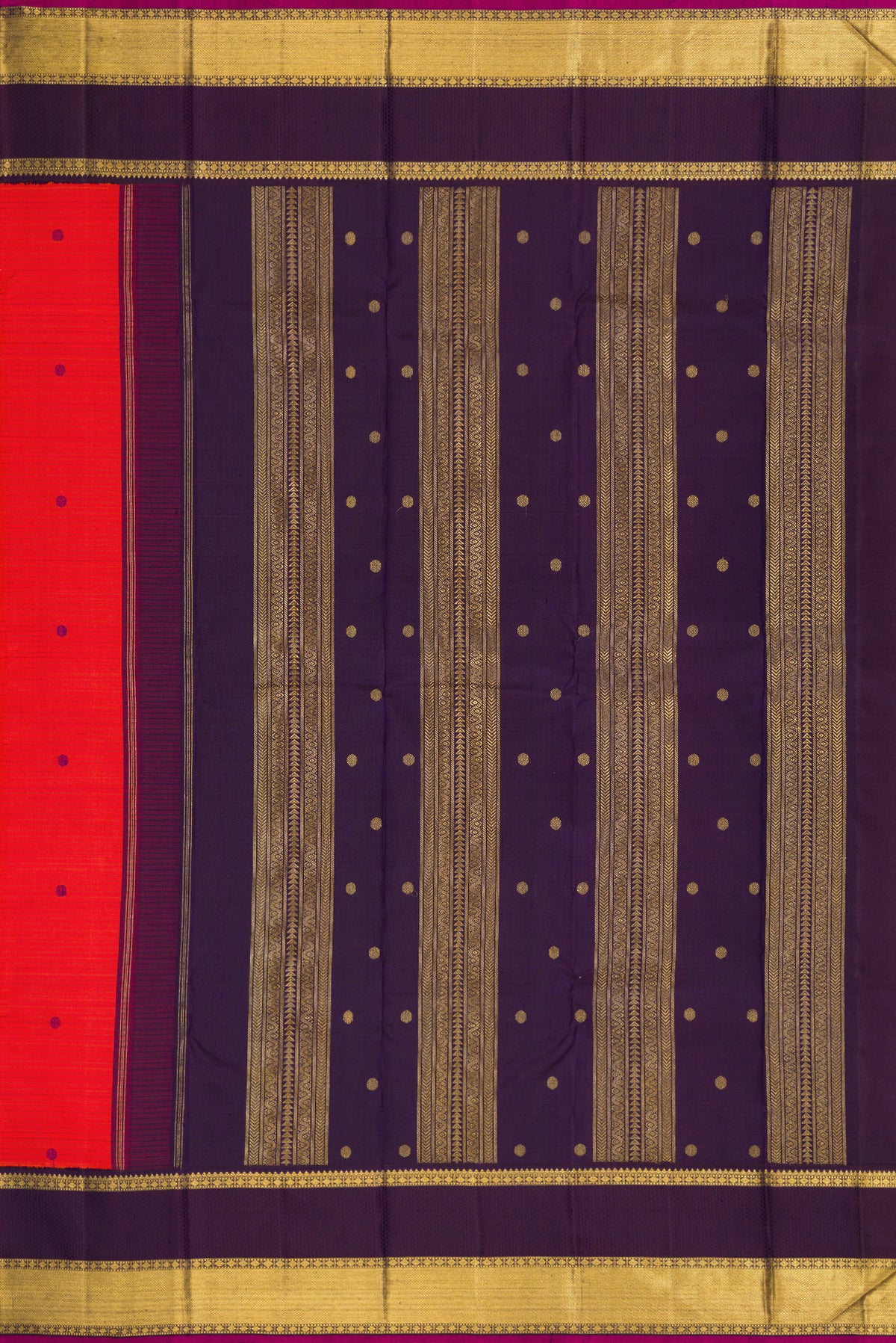 Close up image of the pallu of Pure Silk Pure Zari Orange Dual Tone Kanjivaram Saree with Thread Butta on the body and Zari Border. 