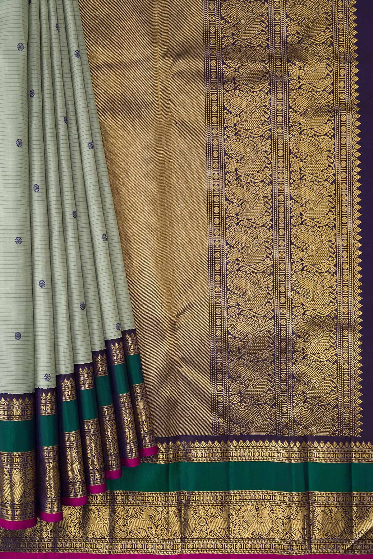 Pleats and pallu of Pure Silk Pure Zari Grey Dual Tone Kanjivaram Saree with Stripes on the body and Zari Border. 