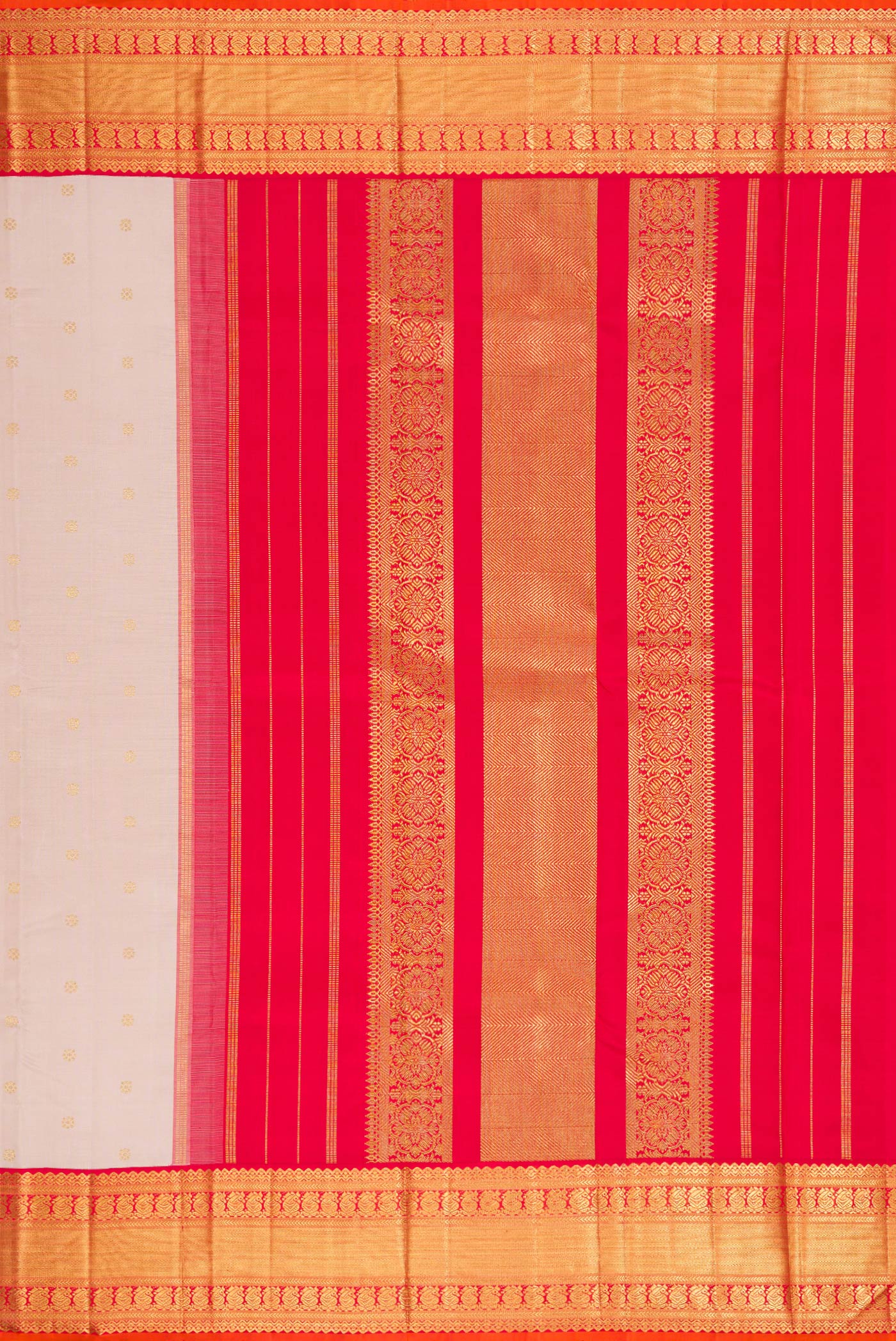 Close up image of the pallu of Pure Silk Pure Zari Rose Gold Dual Tone Kanjivaram Saree with Zari Butta on the body and Zari Border. 