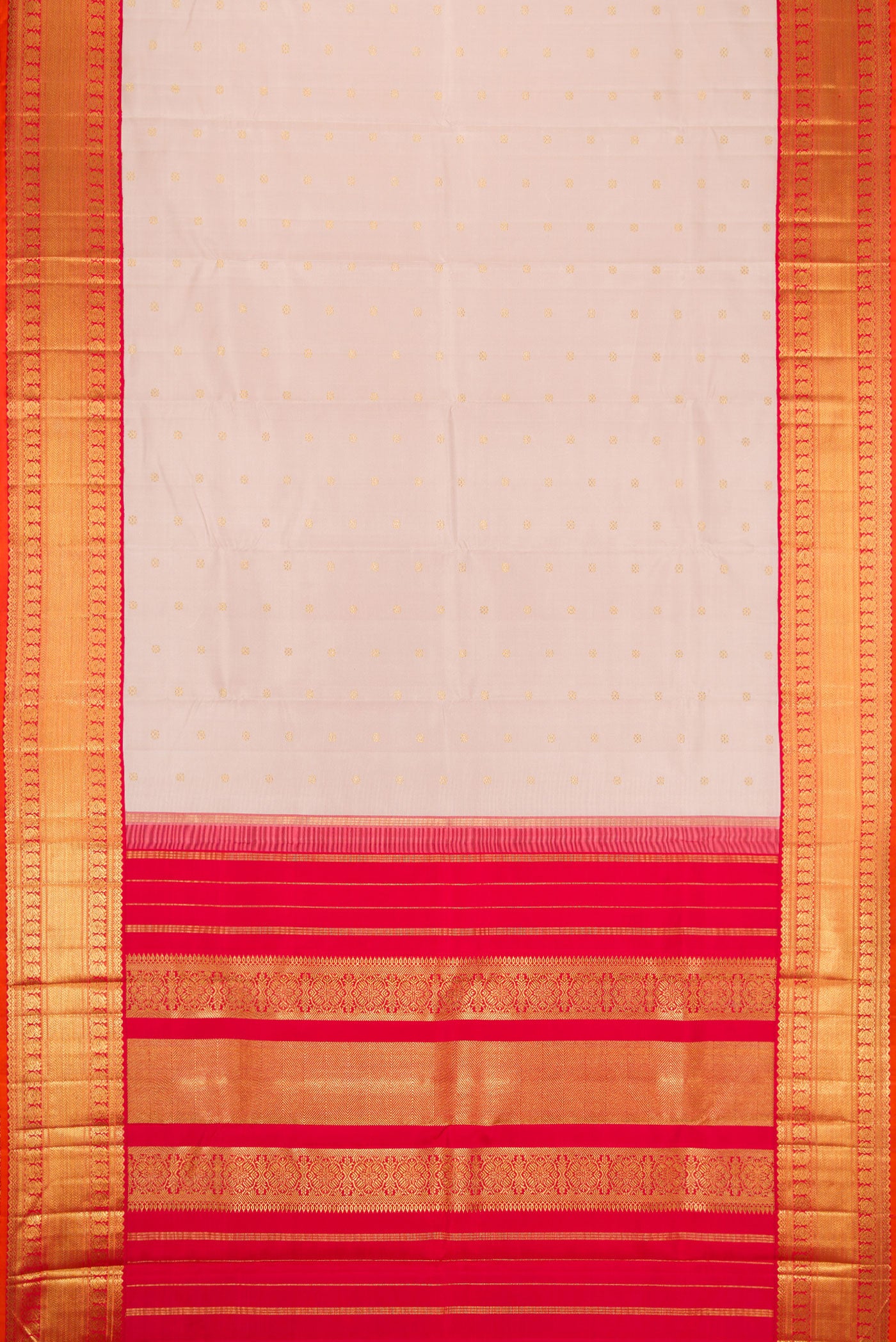 Flat view of Pure Silk Pure Zari Rose Gold Dual Tone Kanjivaram Saree with Zari Butta on the body and Zari Border. 